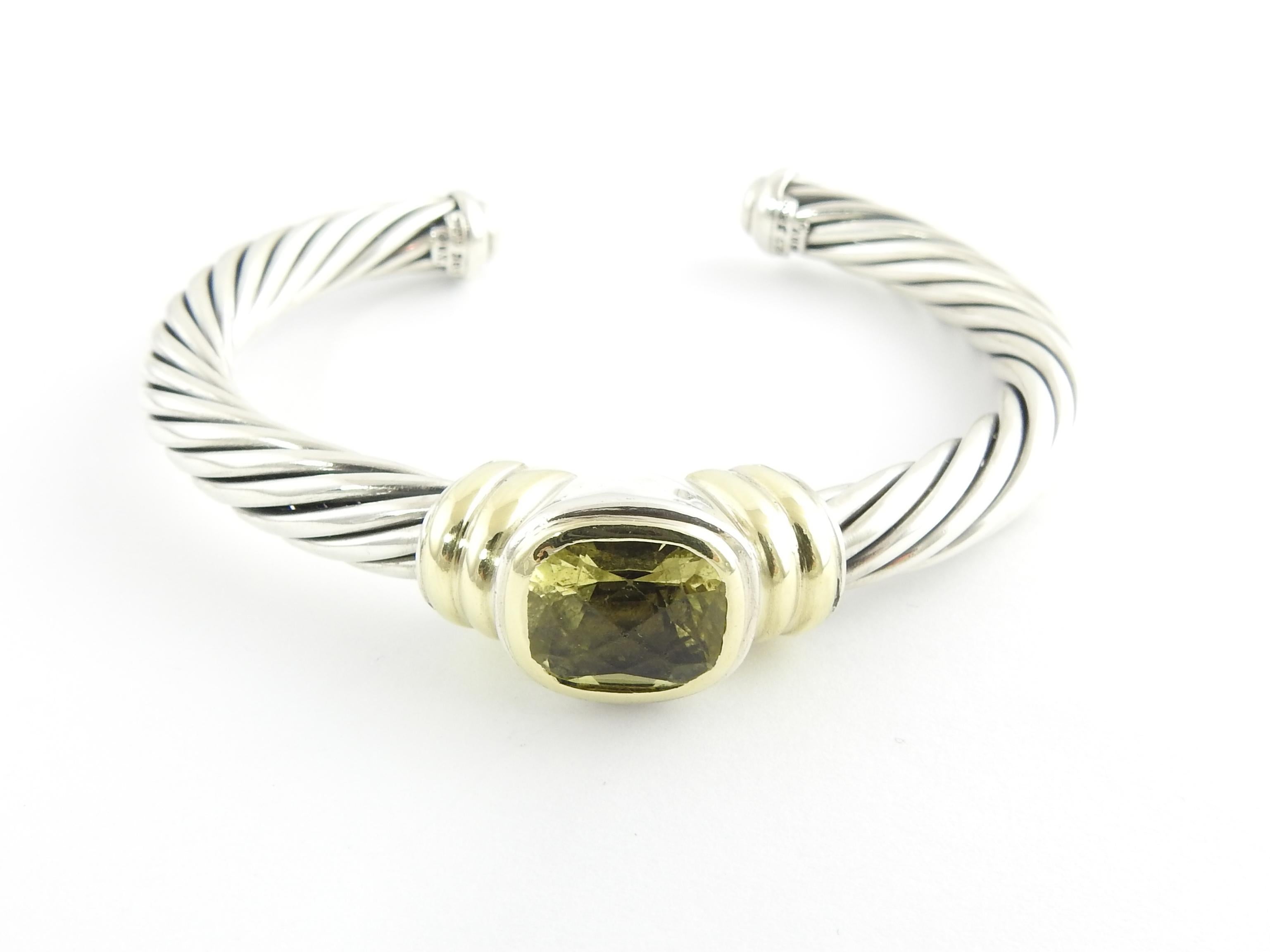 David Yurman Noblesse 14K Yellow Gold Sterling Silver Lemon Citrine Bracelet

This authentic David Yurman bracelet is 7mm wide

Front of the bracelet is 14K yellow gold with a center faceted citrine stone. Stone is approx. 11mm x 9mm

Gold in the