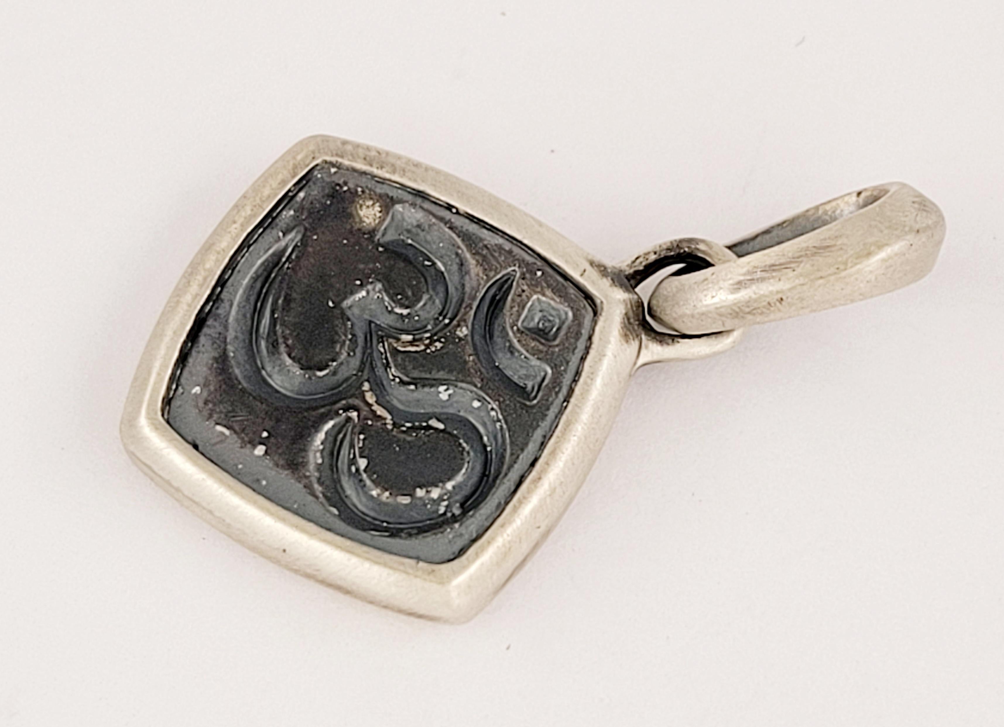 David Yurman Om pendant
Material Sterling Silver925
Pendant Dimension 18.7mm X 22.7mm 
Pedant Length with Bail 30.9mm 
Pendant Weight 4.7gr
Gender Men 
Condition New, never worn
Comes with David Yurman pouch