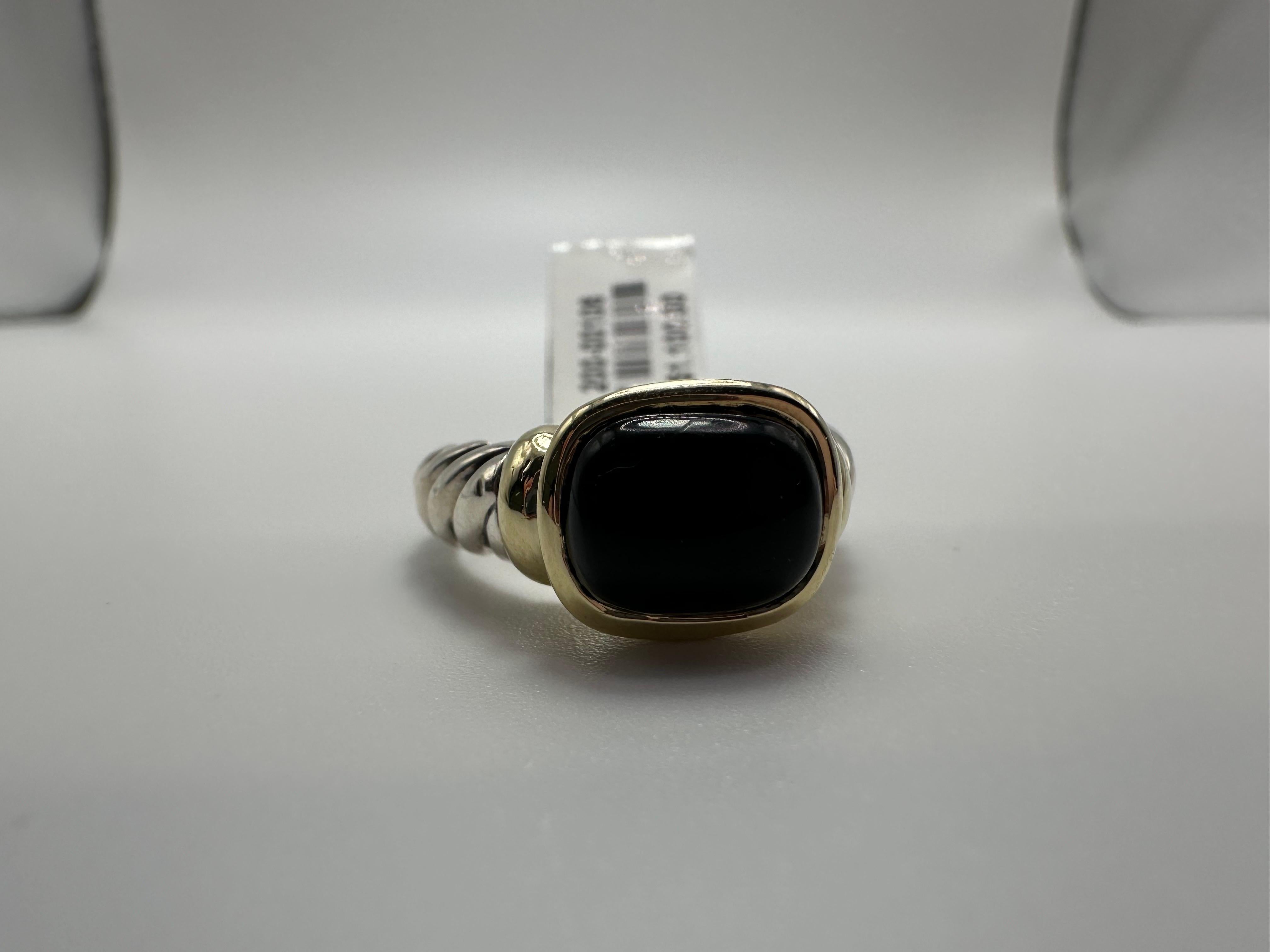 Signet ring by David Yurman with black onyx in silver and 14KT gold, size 7 can be re-sized free of charge!

WHAT YOU GET AT STAMPAR JEWELERS:
Stampar Jewelers, located in the heart of Jupiter, Florida, is a custom jewelry store and studio dedicated