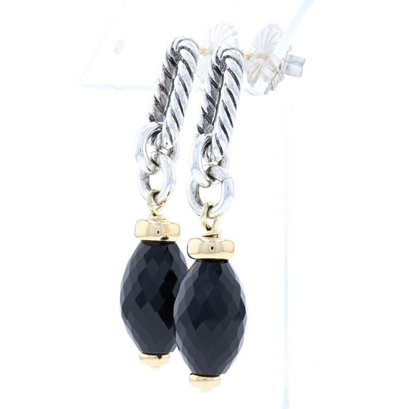 Surprise a special friend or family member with these chic designer earrings! Created by David Yurman in sterling silver and high purity 18k yellow gold, this dangle-style pair features beautifully-faceted genuine onyxes. The backs of the earrings