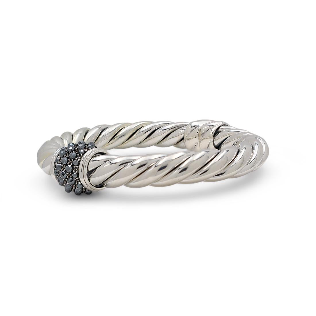 Authentic David Yurman ''Osetra'' bangle crafted in sterling silver. The bracelet is set with 37 faceted round hematites. Size 6 US, 15 EU. The bangle measures 9mm wide. Signed D.Y, 925. The bangle is not presented with the original box or papers.