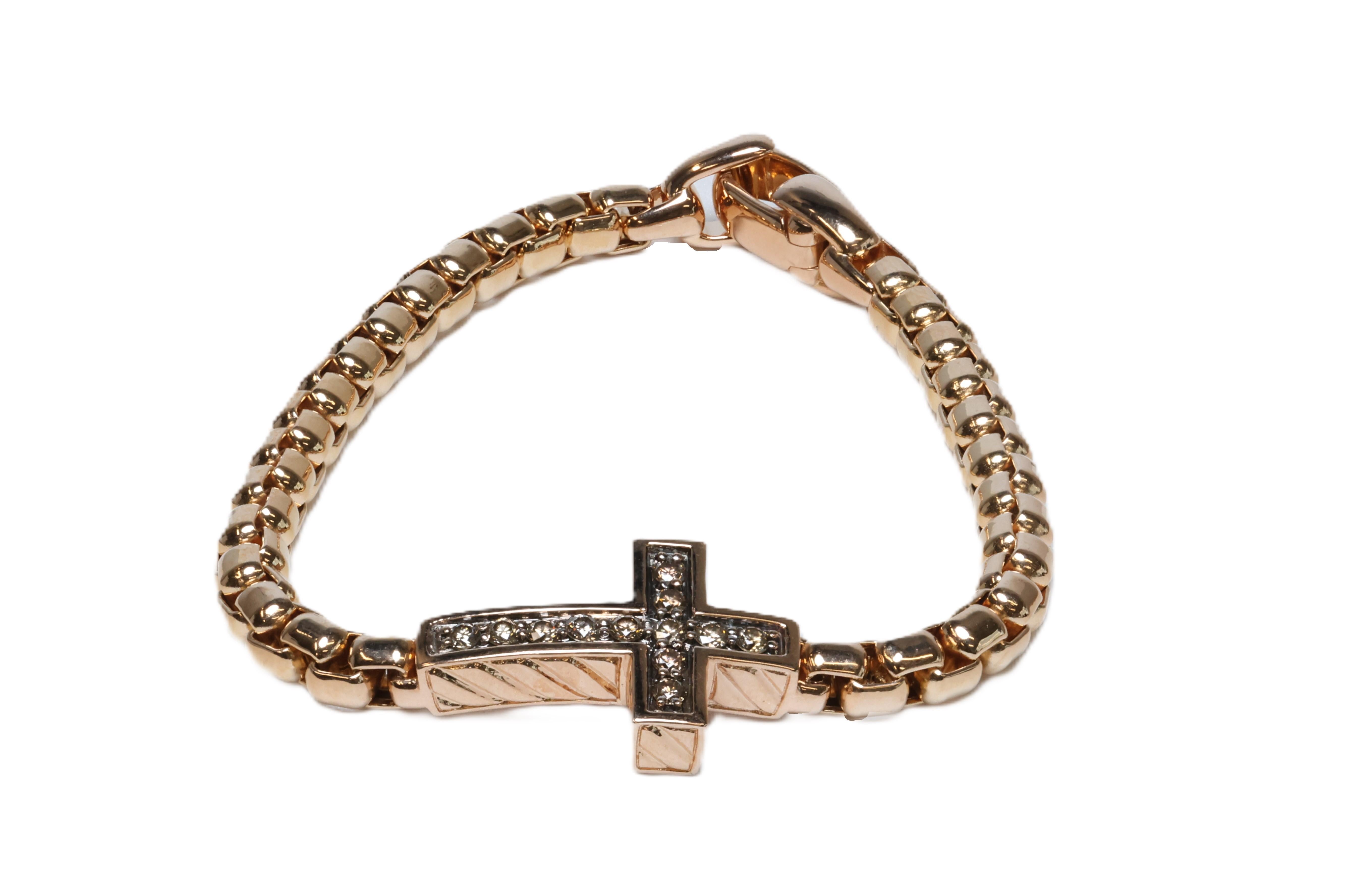 David Yurman Pave Cross Bracelet 18k Rose Gold with Cognac Diamonds Size Medium 

  18K Rose Gold 
  Pave-set Cognac Diamonds, 0.56 Carat Total Weight 
  Bracelet, 5mm
  Cross, 27 x 16mm 
  Push Clasp
  Size Medium Fits Wrists up to 7.75in