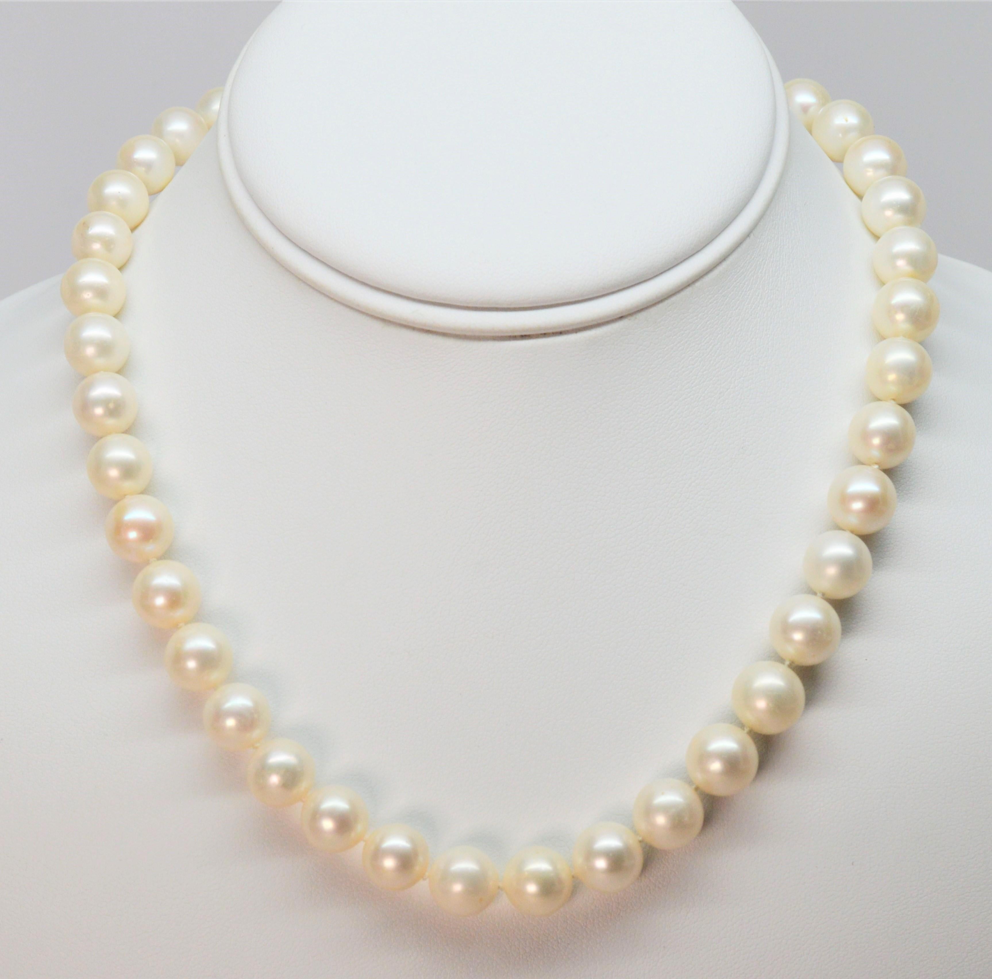 This timeless and versatile necklace design by David Yurman offers the classic beauty of a pearl strand with a contemporary twist. Round white cultured freshwater pearls, 8-8.5mm diameter, creates this 18 inch necklace that is enhanced with a pave