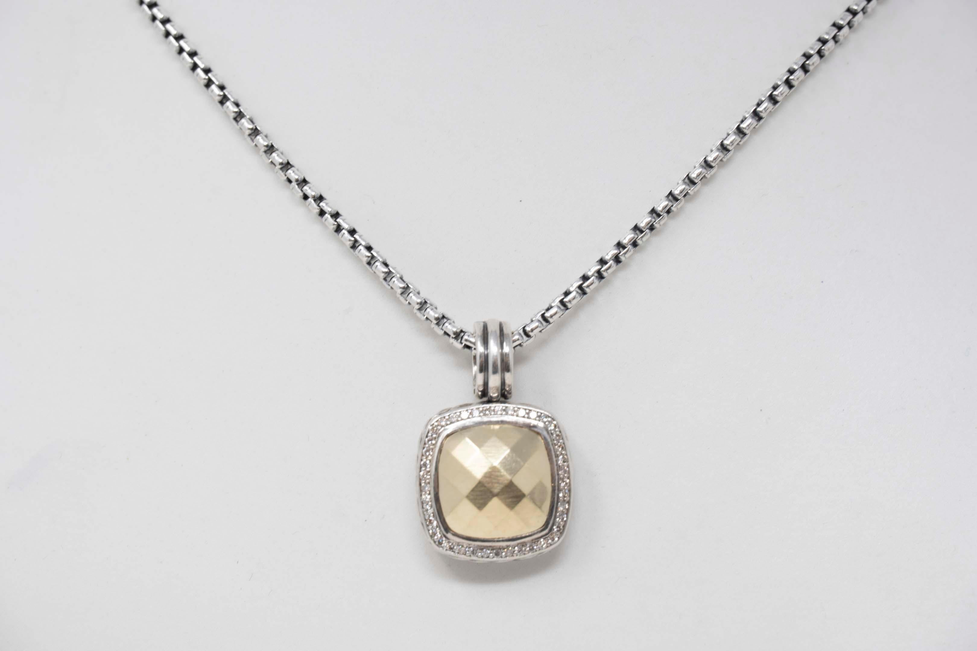 David Yurman 925 silver & 18k yellow gold faceted gold dome pendant, 21mm x 21mm top, set with 42 diamonds, 17 inches long chain included, pendant marked DY 925 1/4 750 chain marked DY 925, 585. Good condition, 21st century total weight 24.8 grams.
