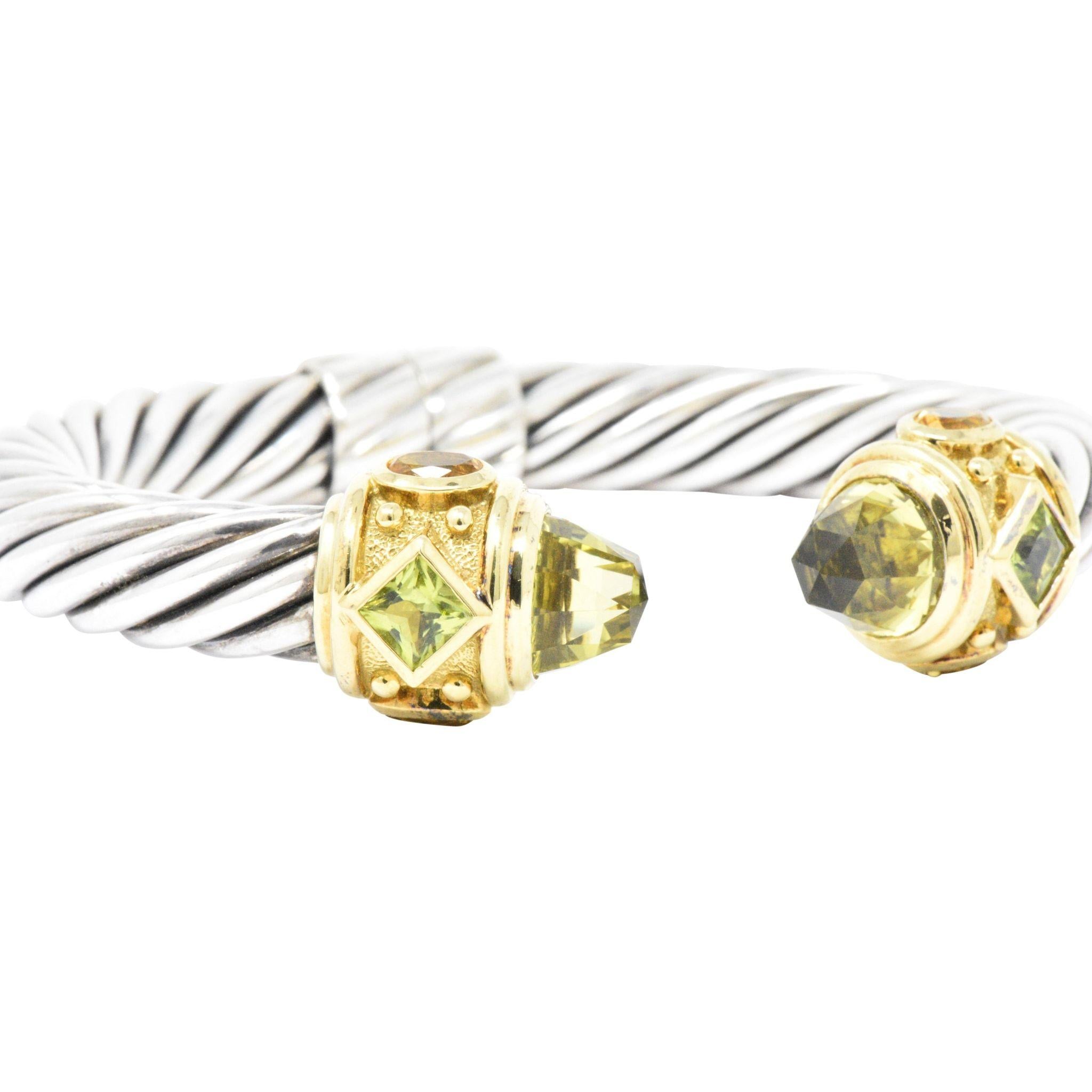Twisted sterling silver completed by 18K gold with square cut peridot, oval cut citrine, and faceted lemon quartz terminals
The stones are all bezel set with polished and textured gold detail
Hinged for easy application or removal
Contemporary