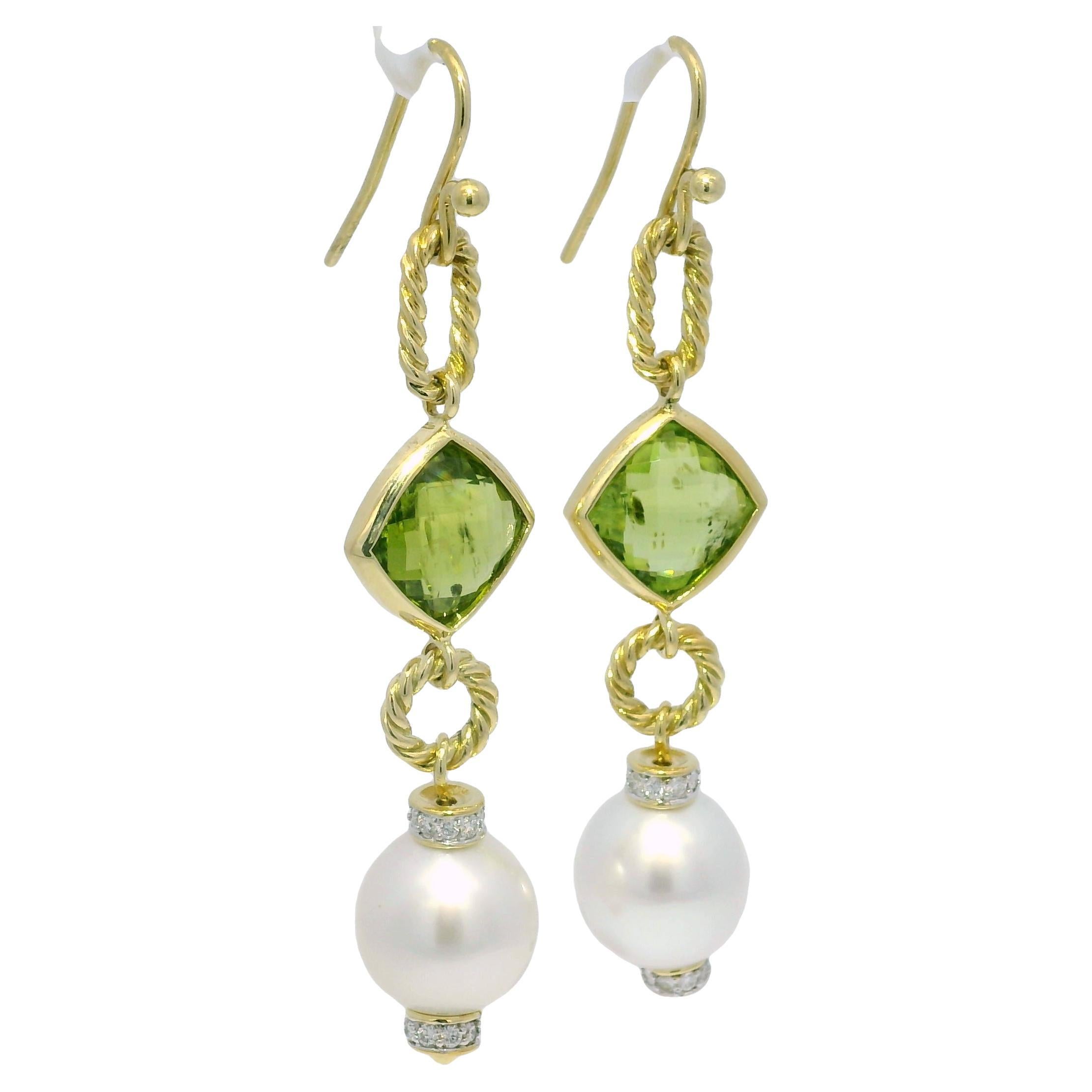 David Yurman Peridot, Pearl & Natural Diamond 18-Karat Drop Earrings

These David Yurman 18k yellow gold earrings feature peridots, pearls, and natural round brilliant-cut diamonds. The elegant design combines timeless sophistication with brilliant