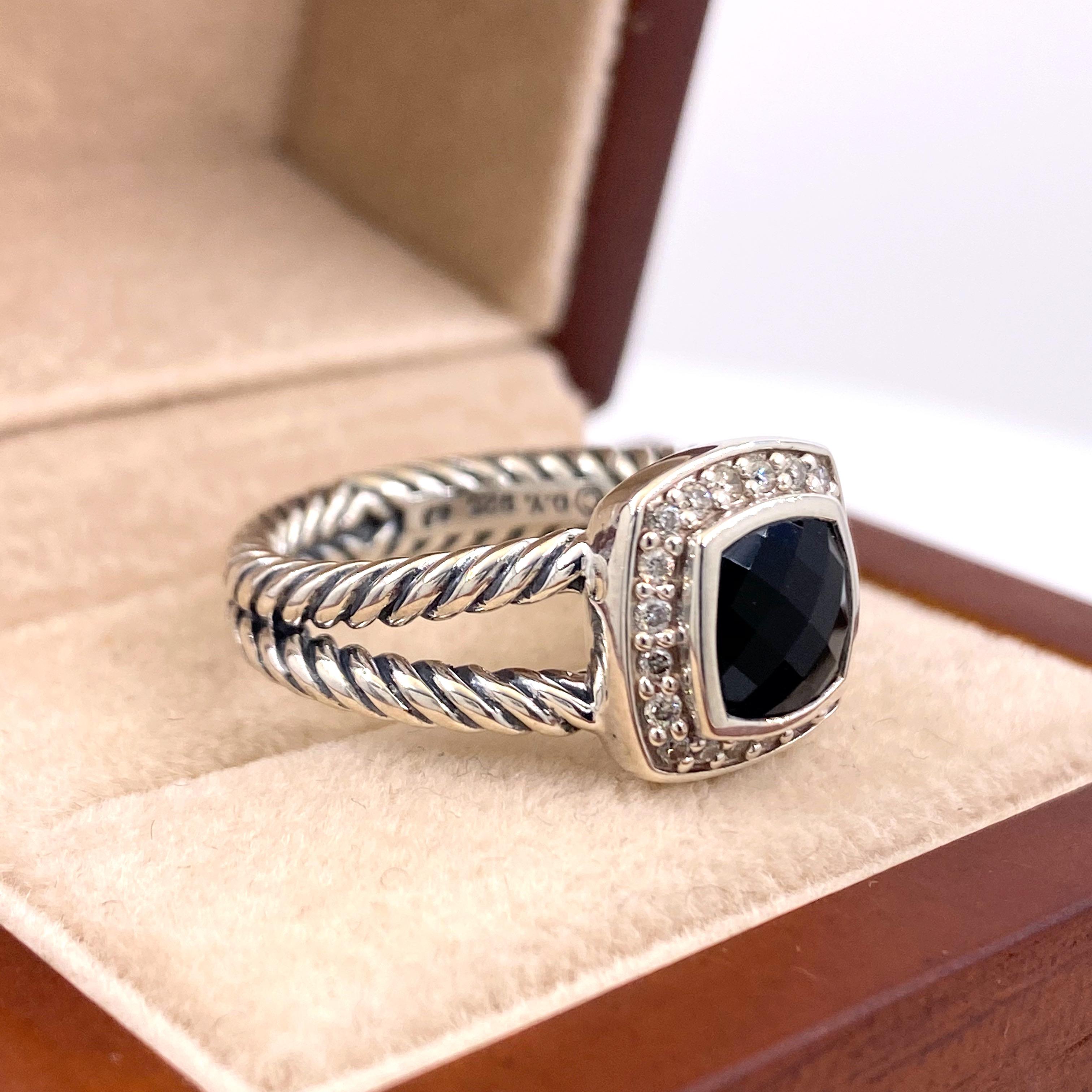 David Yurman Petite Albion Split Shank Ring with Diamonds
Style:  R0744DSSABOD165
Metal:  Sterling Silver
Size:  7.5 sizable
Gemstone:  Black Onyx 7 MM
Diamonds:  0.17 tcw
Hallmark:  ©D.Y. 925
Includes:  Elegant Ring Box
Retail: 