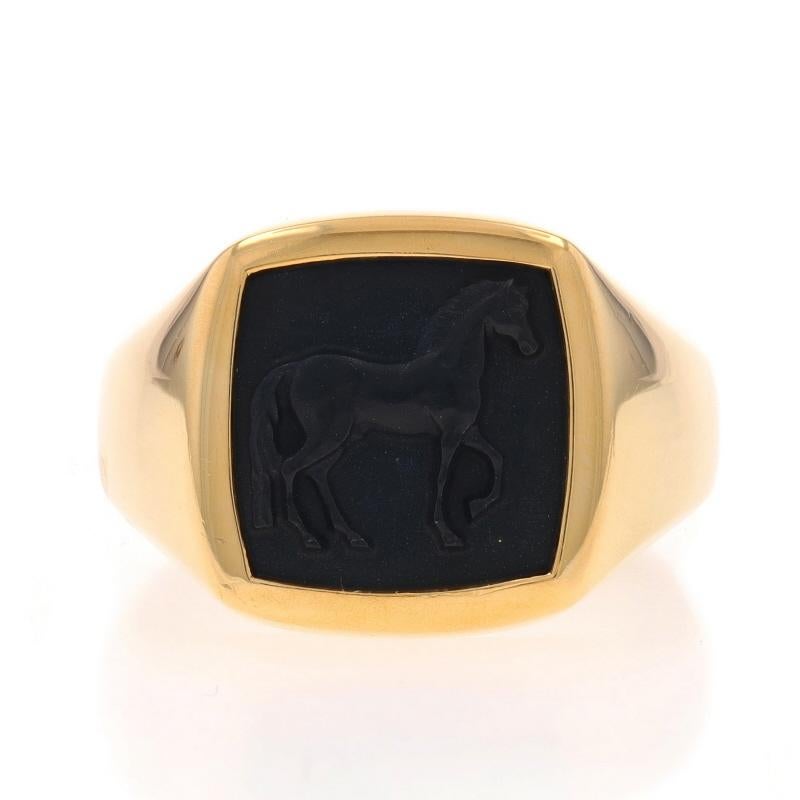 Retail Price: $3150

Size: 9
Sizing Fee: Up 1 size for $100 or Down 1/2 a size for $60

Brand: David Yurman
Collection: Petrvs
Design:  Men's Horse Ring

Metal Content: 18k Yellow Gold

Stone Information
Natural Onyx
Cut: Cameo
Color: Black

Style: