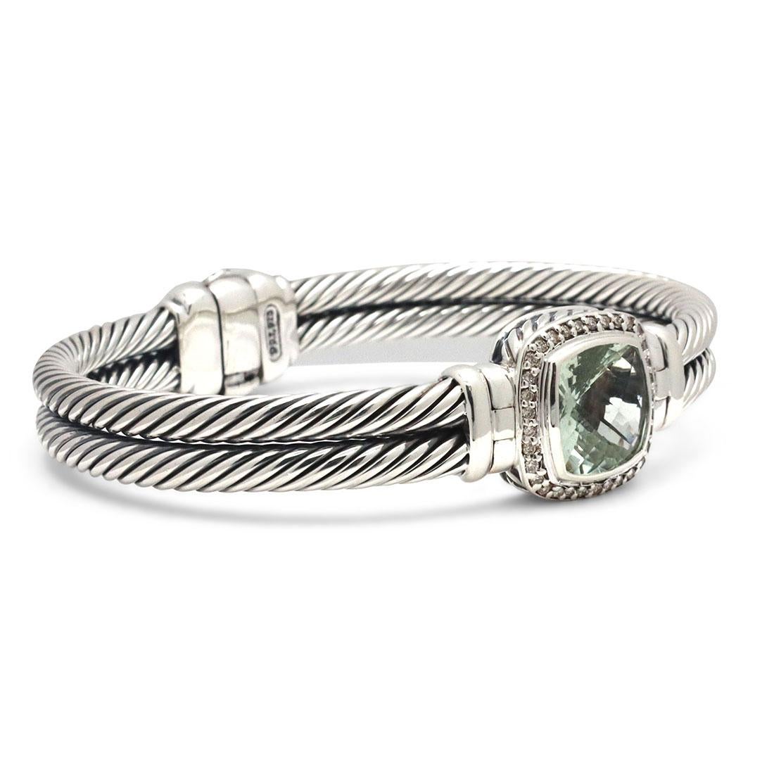 Authentic David Yurman bangle, crafted in sterling silver. The bracelet is set with one faceted prasiolite stone and approximately 0.26 carats of round brilliant cut diamonds around the main stone. Signed D.Y, 925 The bangle is a US size 5 1/4 and