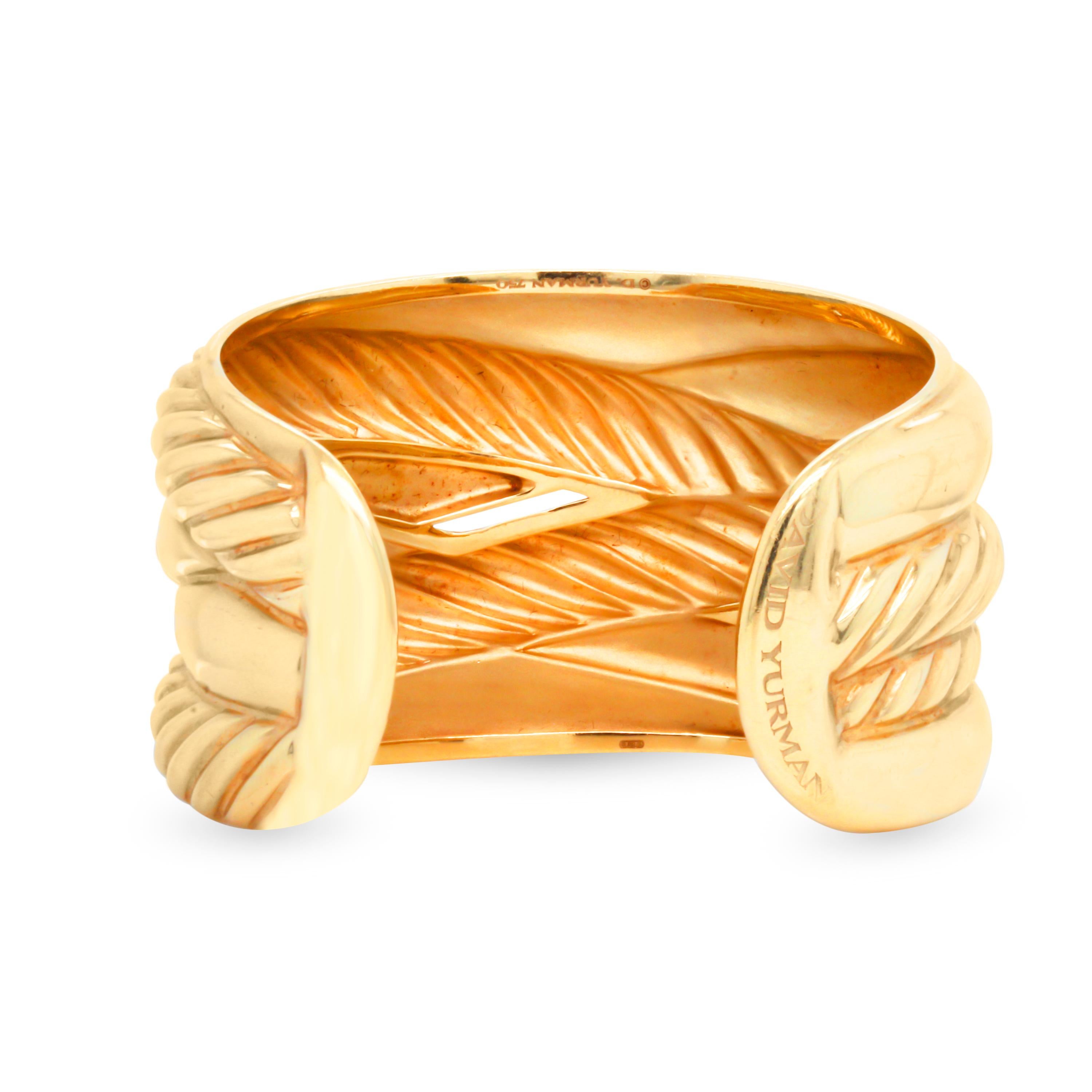 18K Yellow Gold Wide Cuff Bangle Bracelet from the Pure Form collection by David Yurman

This unique and elegant cuff bangle features a cable-like design and is open underneath to fit perfectly on the wrist

Bangle is 1.61 inch width. 7 inches in