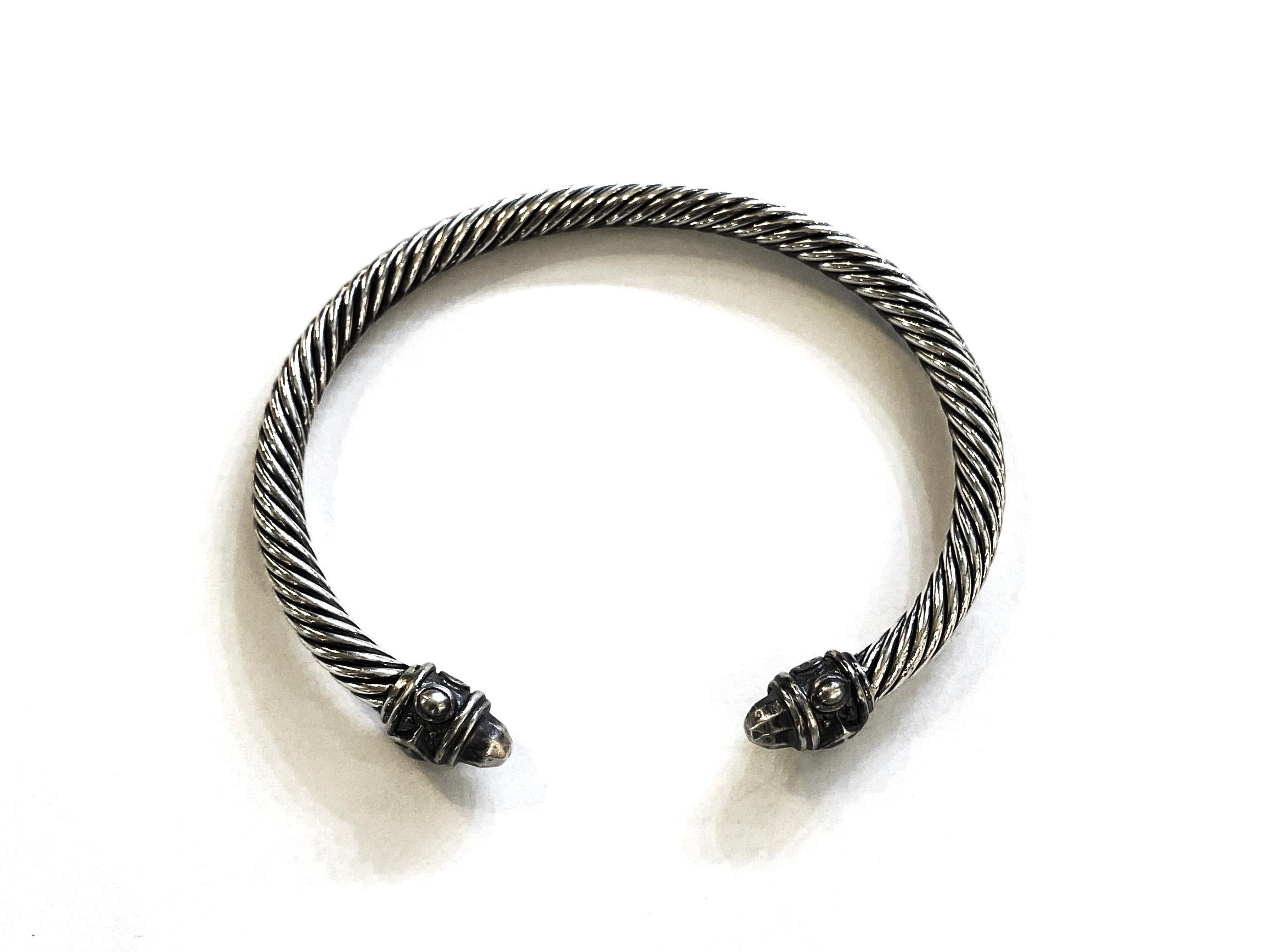 A David Yurman icon, the Renaissance Cable Bracelet combines sculptural form with the brilliant jewel tones found in classical painting.

Sterling silver
Bracelet, 5mm
Size, medium
Inner circumference, 7