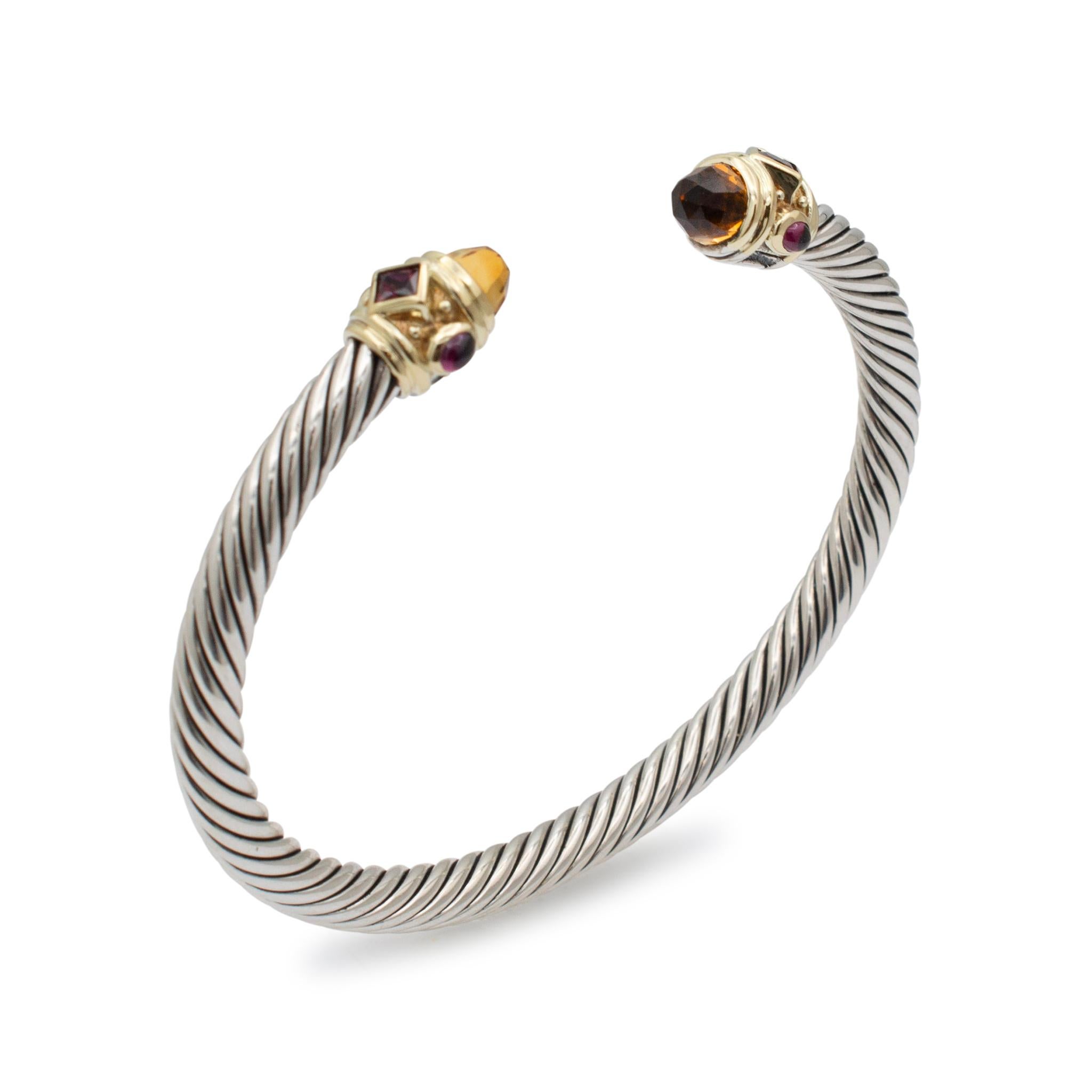 Brand: David Yurman

Gender: Ladies

Metal Type: 14K Yellow Gold & 925 Sterling Silver

Length: 6.00 Inches

Width: 5.00 mm

Weight: 29.20 grams

Ladies 14K yellow gold and silver amethyst citrine and garnet cuff bracelet. The metals were tested and