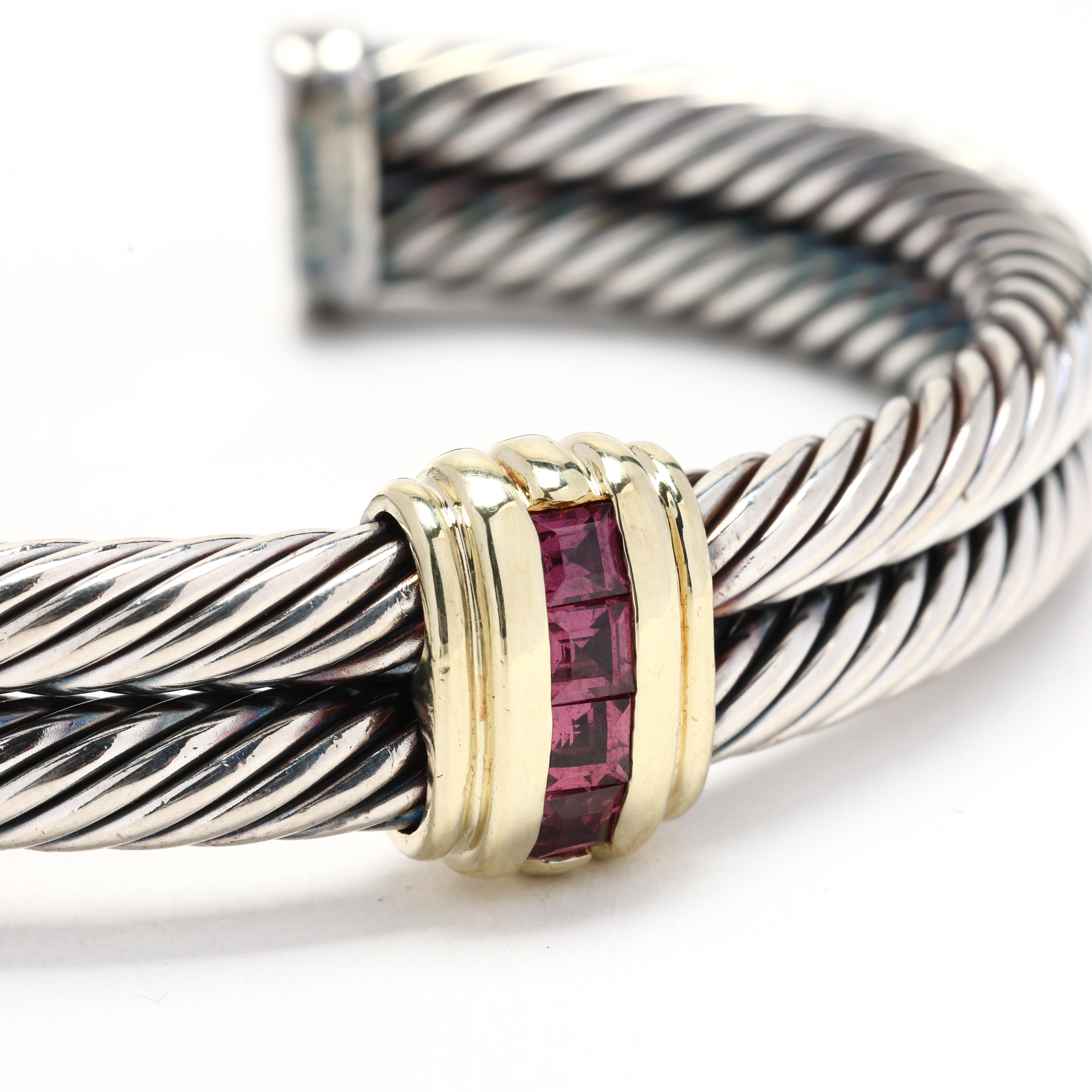 This exquisite cuff bracelet from renowned designer David Yurman showcases the perfect combination of 14k yellow gold and sterling silver. The bracelet features a bold and eye-catching design with a unique combination of textures and materials.