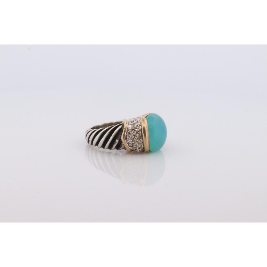 Vintage from the 1980s
Size: 7 US
Materials: Silver
Gemstone: Diamond
Gem color: Blue

Band color: Gold

Iconic David Yurman Jewelry. Beautiful Cable Ring cast with Sterling Silver and 18k yellow gold.

Large Chalcedony Cabochon with Diamonds pave