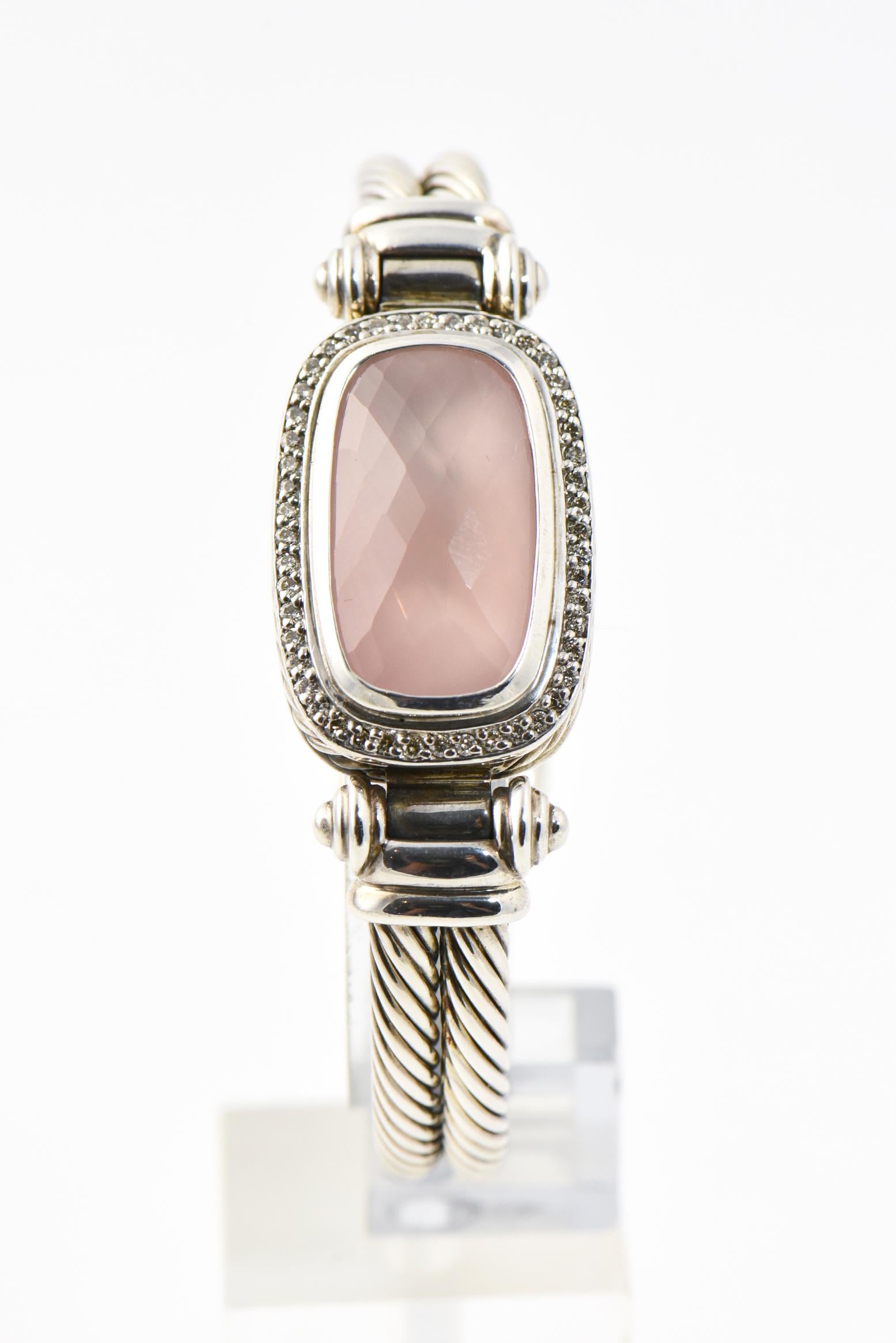DY Double thin sterling cable bangle with large rectanglular center section featuring a rectangular facetted rose quartz with a pave diamond frame. The double cable area is 7.8mm wide. The stone area is 18.9 mm wide with a flush clasp that is opened