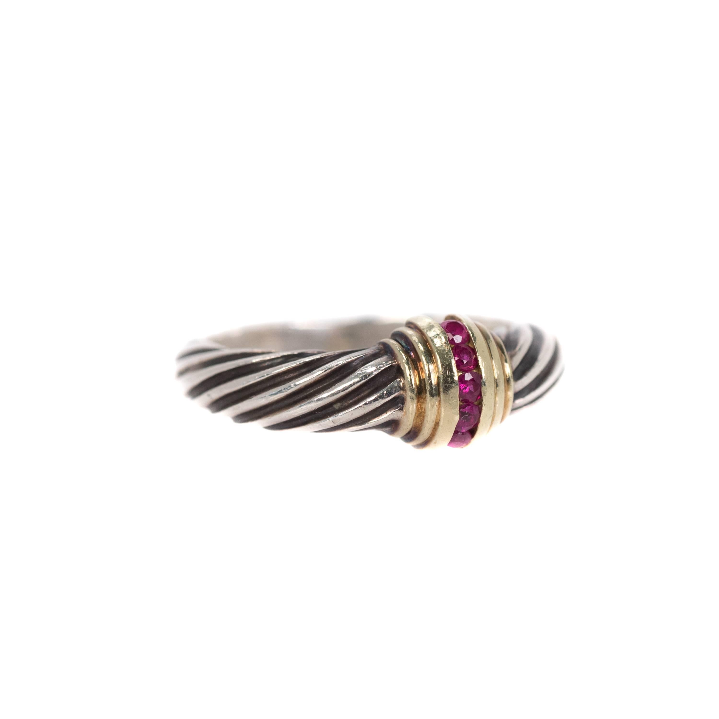 Rare, Retired Design - David Yurman Cable Ring with Rubies -  Sterling Silver, 14k Yellow Gold, Rubies

Features David Yurman's signature single Cable design crafted in shining Sterling Silver. 
The ring front is accented with a vertical row of 5