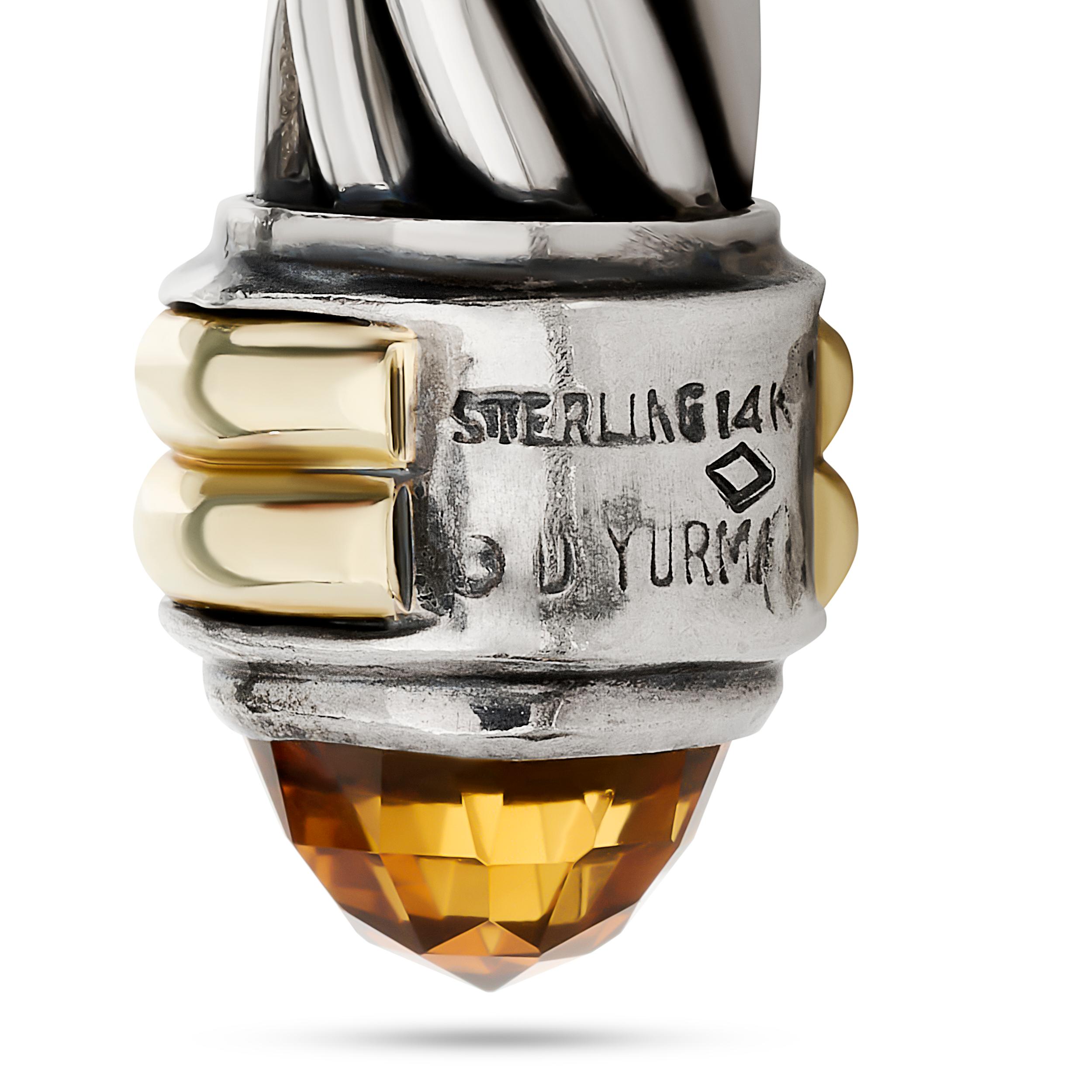 Effortlessly chic, this David Yurman twisted cuff bracelet features a striking double citrine design, set in a cool silver and warm 14K yellow gold, making a bold statement on the wrist.

Signed 