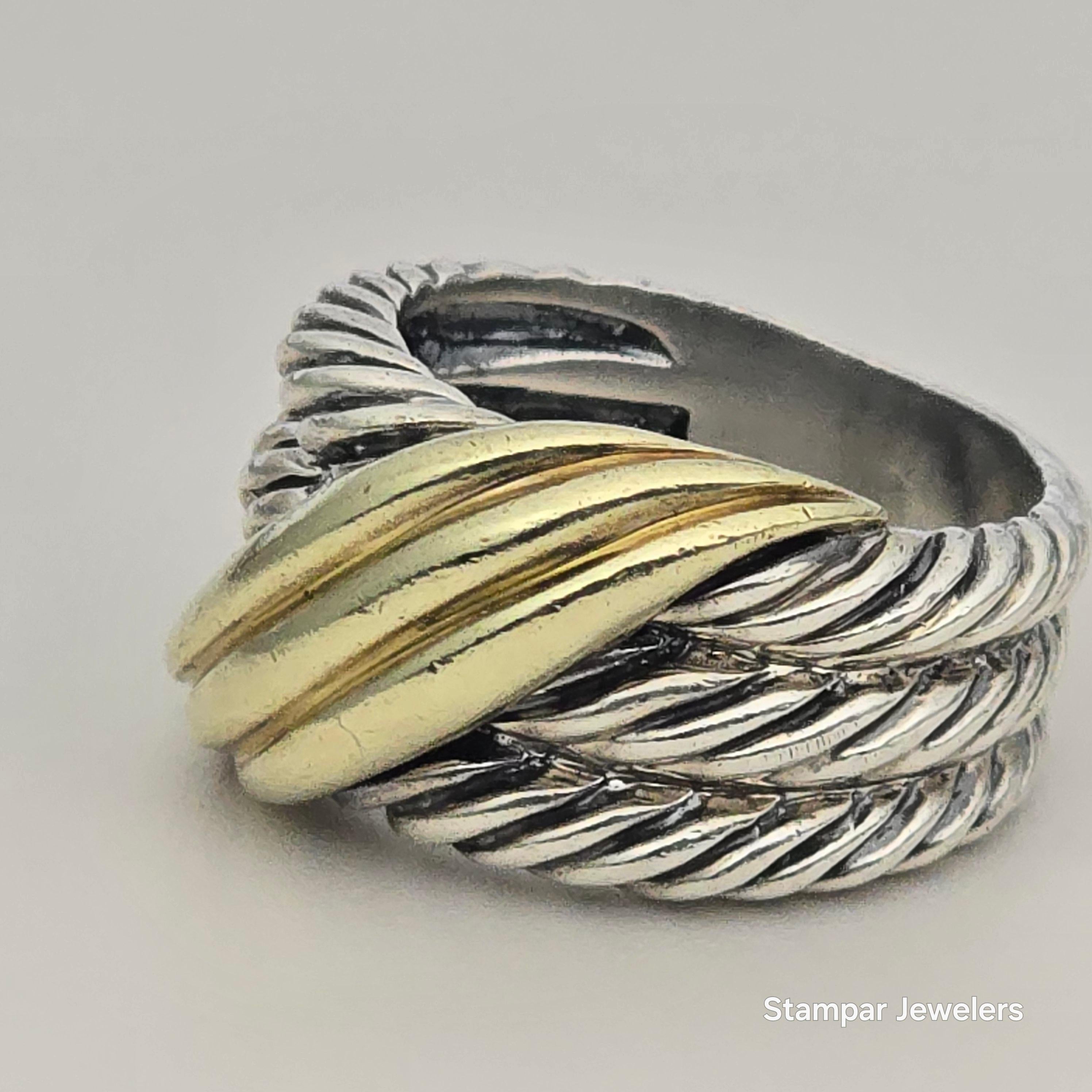 Bague David Yurman en argent et or 14KT, audacieuse et magnifique ! 8 grammes, redimensionnable !
Livré dans une boîte standard et expédition rapide !

CE QUE VOUS OBTENEZ À LA BIJOUTERIE STAMPAR :
Stampar Jewelers, situé au cœur de Jupiter, en