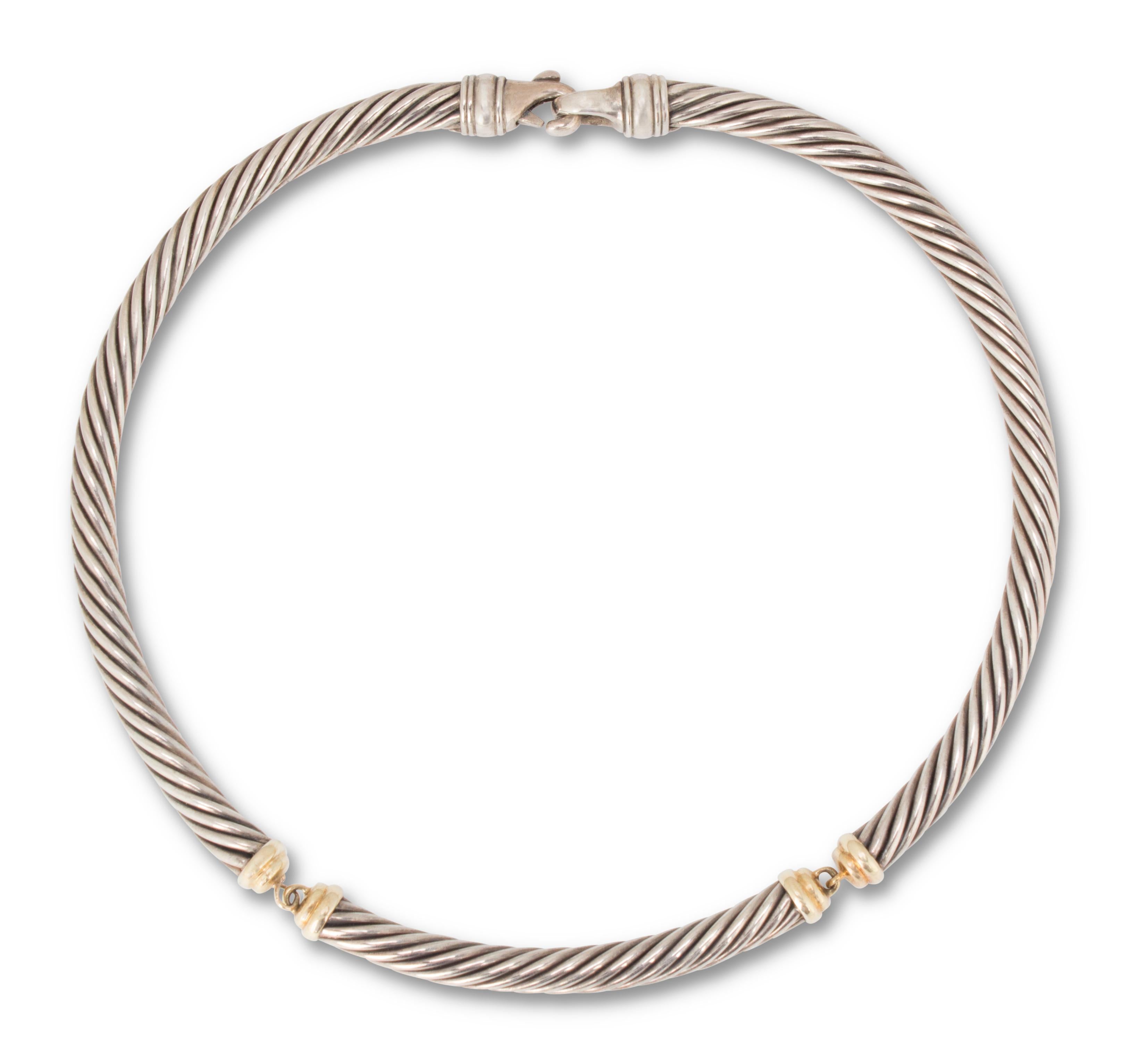 Authentic David Yurman 6mm cable necklace crafted in sterling silver, 14 karat yellow gold and 18 karat yellow gold.  Features Yurman's classic cable design made in 3 links.  5 1/2 inch diameter.  Signed DY, 925, 585, 750.  CIRCA 2000s