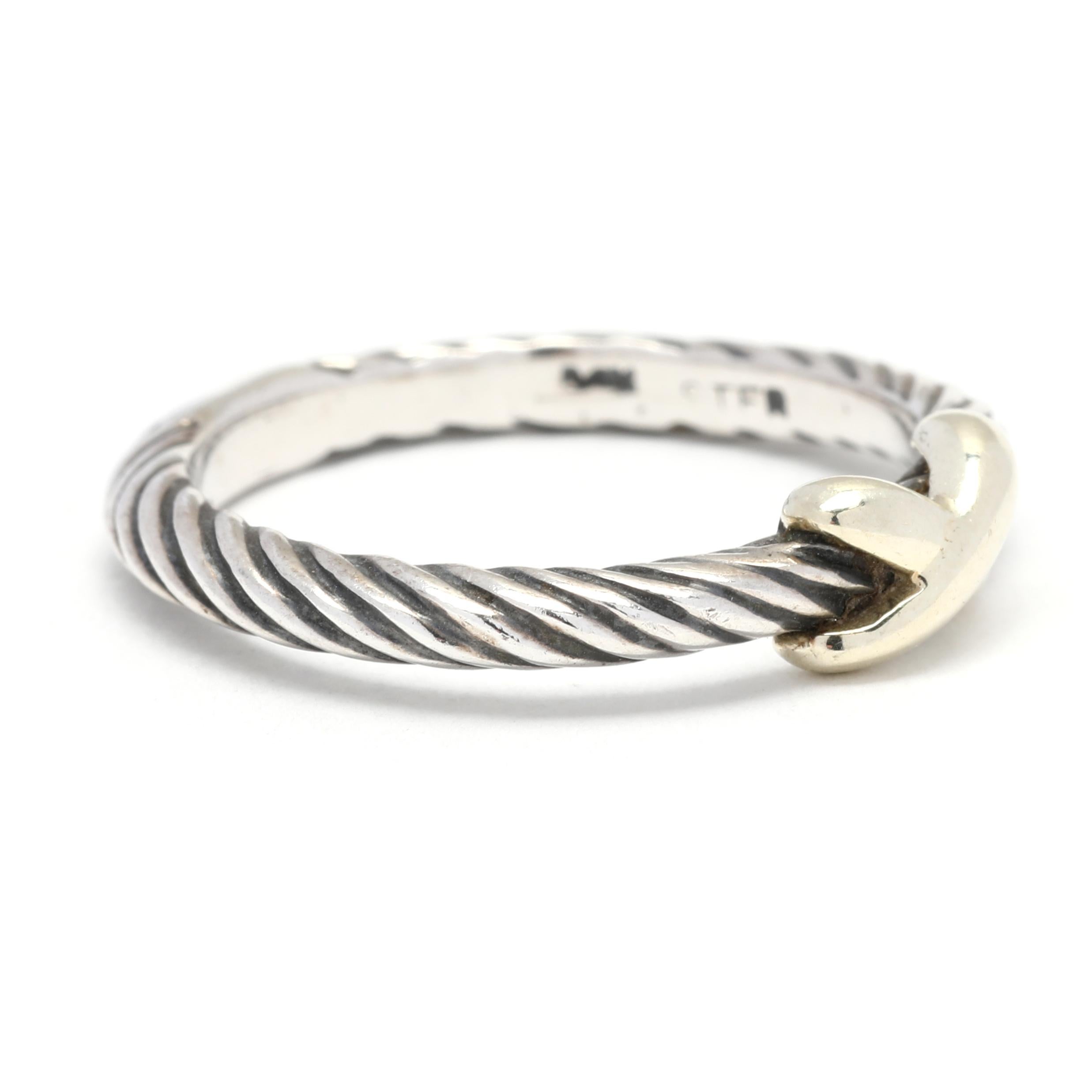 This modernly elegant David Yurman single X stackable band ring is on trend with a timeless luxury feel that you won't want to take off. Handcrafted in 14K yellow gold and sterling silver, adorned with a delicate thin cable band and weighing 6