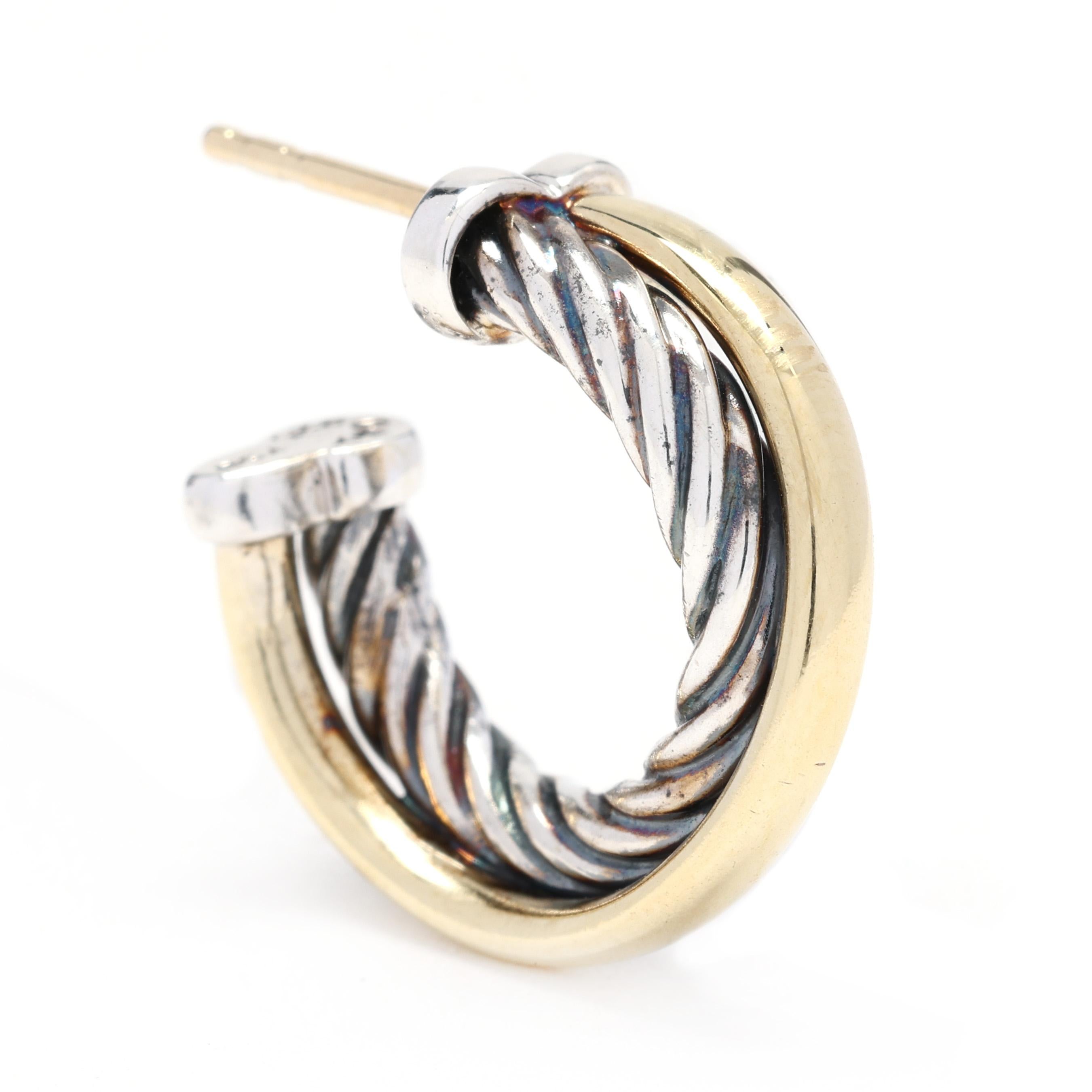 These David Yurman small twisted hoops are a beautiful combination of sterling silver and 18k yellow gold, creating a stunning crossover design. The unique twisted texture adds an element of sophistication and elegance to these classic hoop