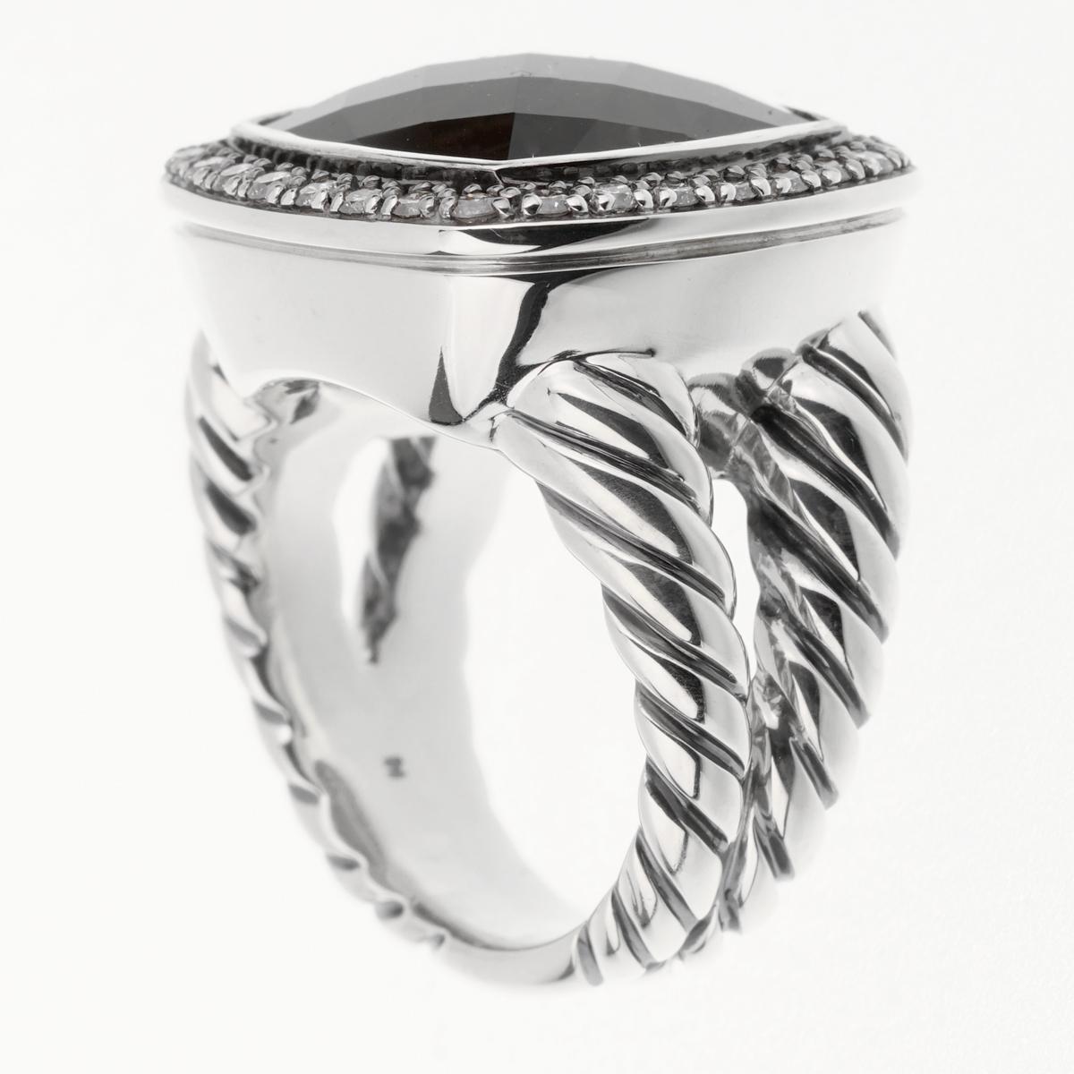 A chic David Yurman ring showcasing a large Smoky Quartz wrapped in round brilliant cut diamonds set in sterling silver.