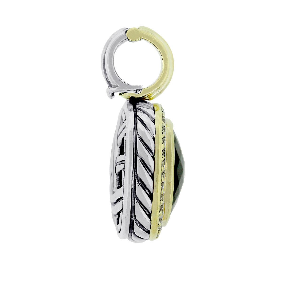 Material: Sterling Silver & 18k Yellow Gold
Diamond Details: Diamonds are G/H in color and VS in clarity
Gemstone Details: Smoky quartz 14mm x 14mm
Pendant Measurements: 0.75″ x 0.35″ x 1.25″
Total Weight: 12.5g (8dwt)
Item comes with original David