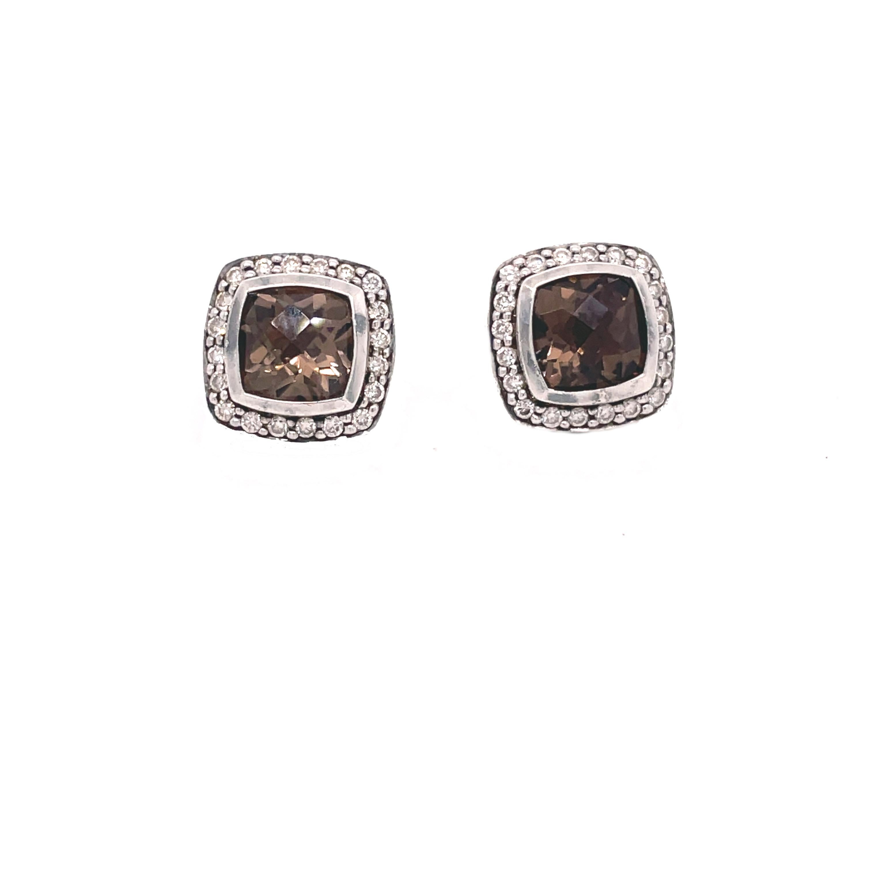 This is an absolutely stunning pair of signed David Yurman earrings that feature beautiful smokey quartz and bright white diamonds. These iconic earrings are perfect for any occasion! 

The sparkling white diamonds create a beautiful light border