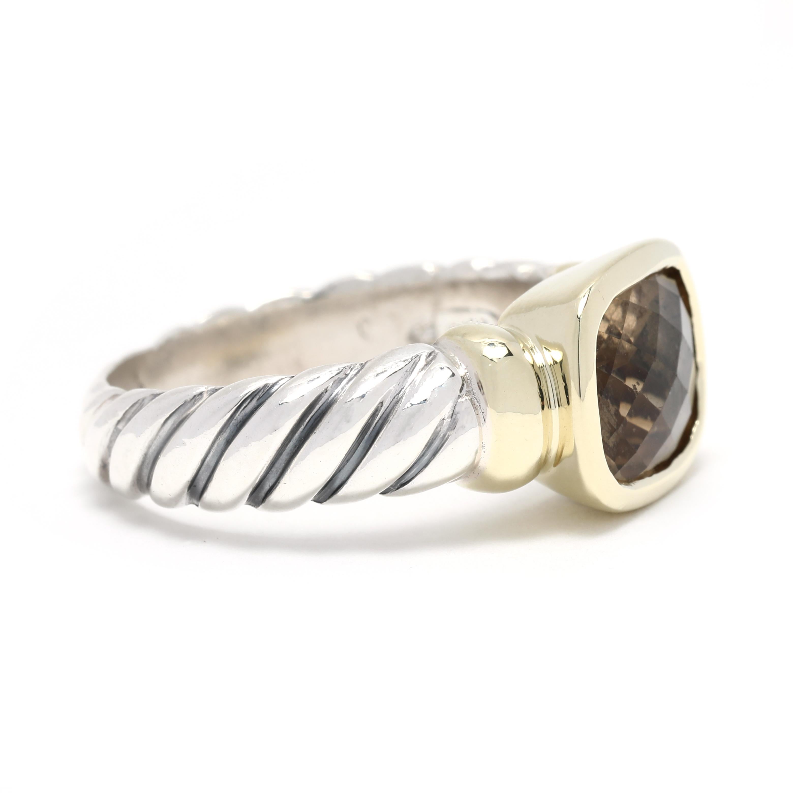 This exquisite David Yurman Noblesse Ring features a beautiful smoky quartz gemstone set in 14K yellow gold and sterling silver. With its delicate, sophisticated design, this statement ring will elevate any look. The ring size is 6.75, perfect for