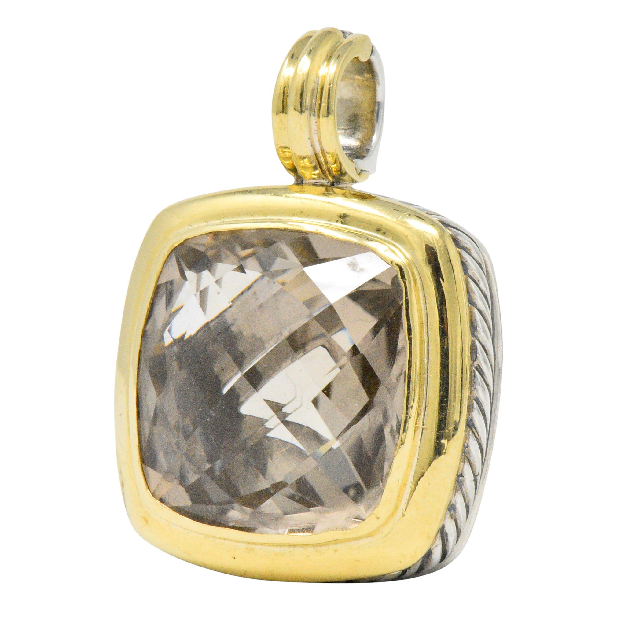 Centering a square checkerboard cut smoky quartz, light brown with a hint of pink, measuring approximately 20.0 x 20.0 mm

Polished gold bezel and twisted silver detail

Hinged bale

Signed D.Y.

Measures: 1 1/2 x 1 Inch

Total Weight: 21.4