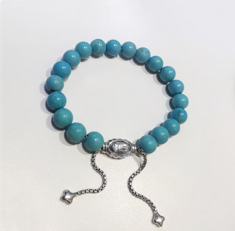 David Yurman D.Y.
Turquoise bead bracelet 
Onyx width  8mm
Material Sterling Silver 925
Comes with David Yurman pouch
Retail price:$450
Condition New, without tags