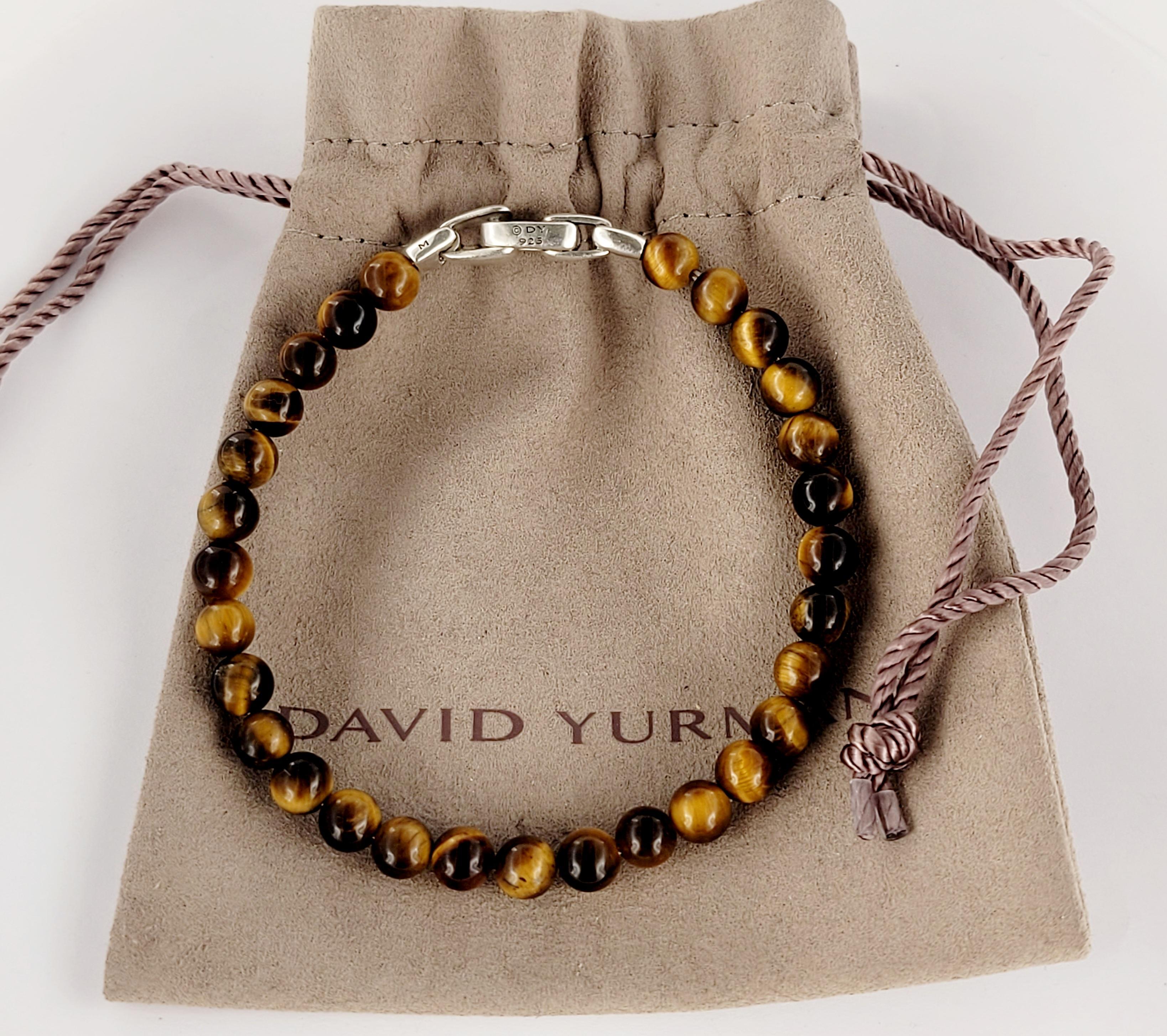 David Yurman Spiritual Bracelet
Style Tiger Eye 
Material Sterling Silver 
Metal Purity 925
Bracelet 6.5mm
Bracelet Length 8.5'' from end to end 
Weight 13.5gr 
Gender Men's 
Condition New, never worn
Comes with David Yurman Pouch