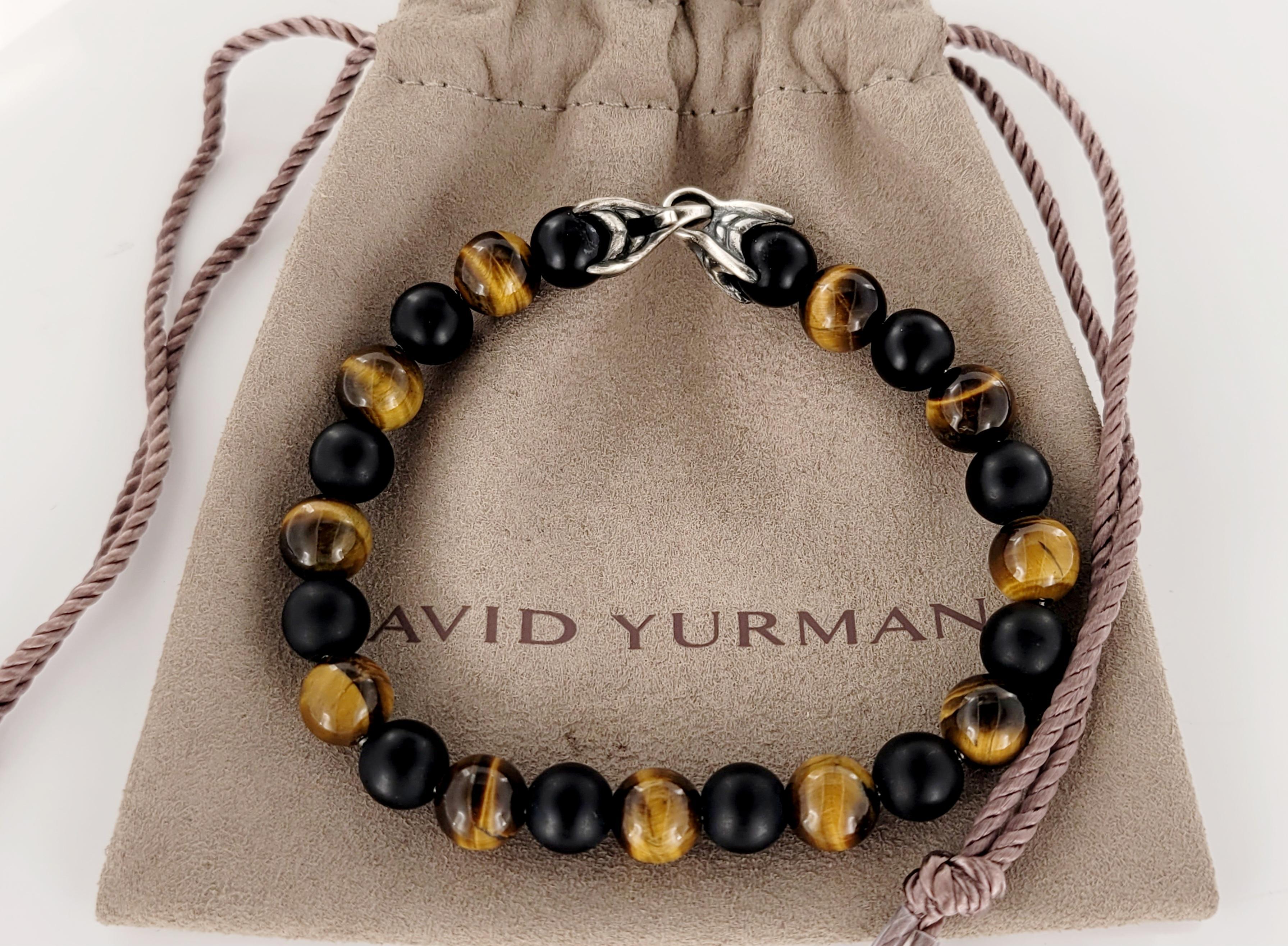 Brand David yurman 
Black & Tiger eye beaded bracelet 
Bracelet Beads 6mm 
Bracelet Length 8'' Long
Condition New, never worn 
Comes with David Yurman pouch
