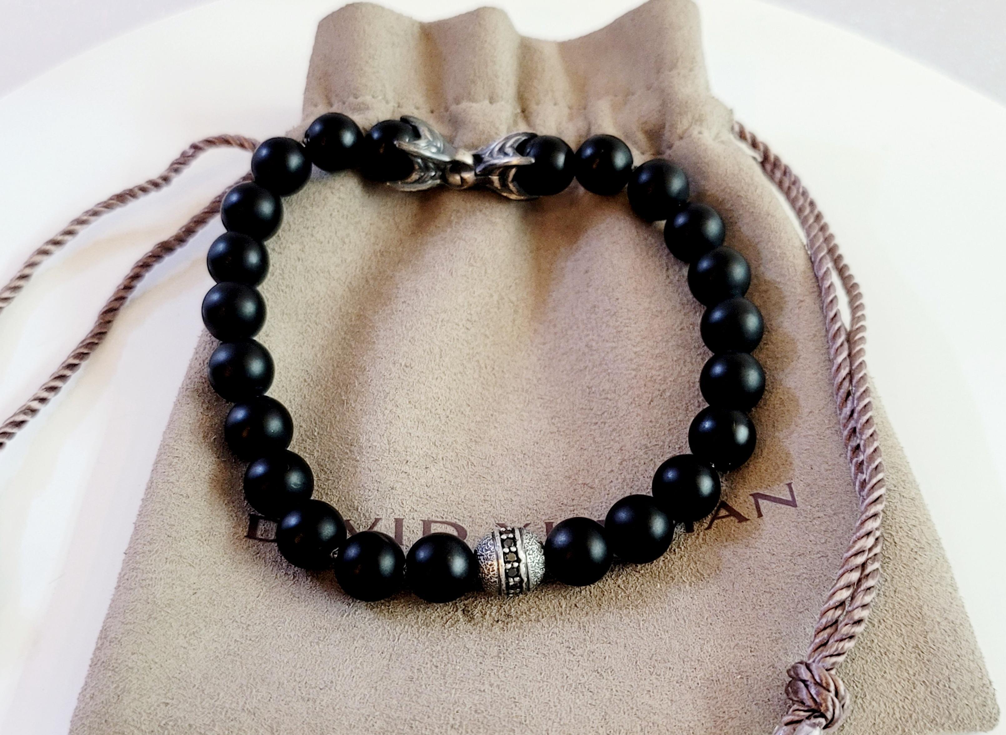 Brand David Yurman 
Material Sterling Silver 925
Black Onyx 8mm
8 inch length
Pave-set black diamonds, 0.32 total carat weight 
Lobster Claps
Condition New, never worn 
Comes with David Yurman pouch.