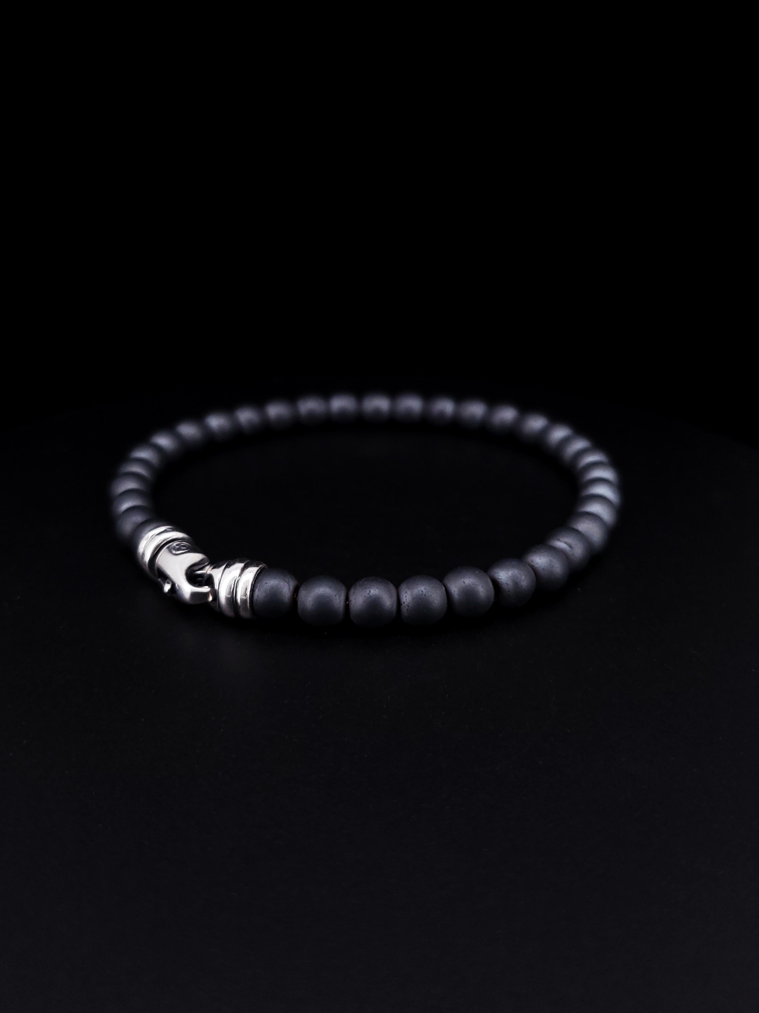 Inspired by the prayer beads found in many cultures, these meaningful designs feature a variety of smooth, vividly colored stones, representing the union of symbolism and style.
-Sterling Silver
-6mm Matte Gray Beads
-7 3/4 inches Bracelet