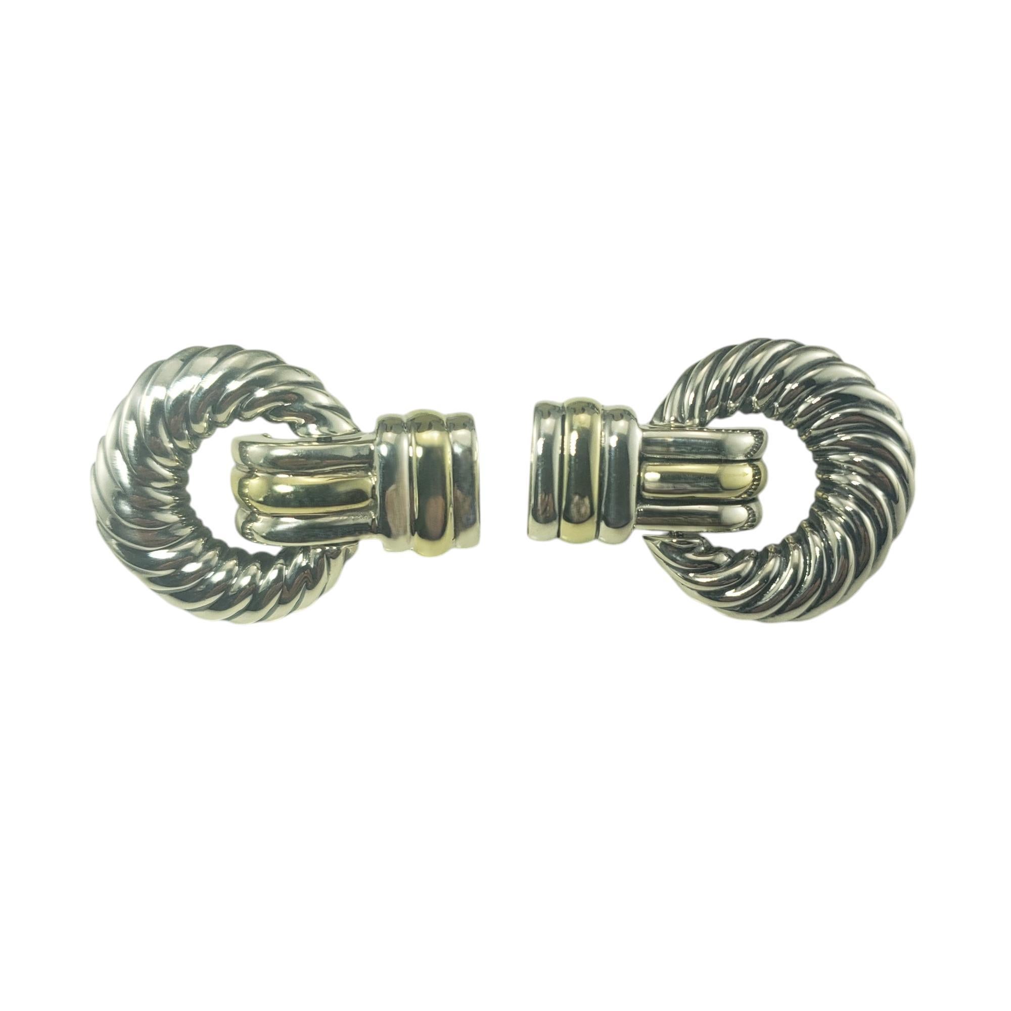 David Yurman Sterling Silver and 14K Yellow Gold Thoroughbred Doorknocker Earrings-

These stunning earrings by David Yurman are crafted beautifully detailed sterling silver and 14K yellow gold. Omega back closures.

Size: 33 mm x 24 mm

Weight: