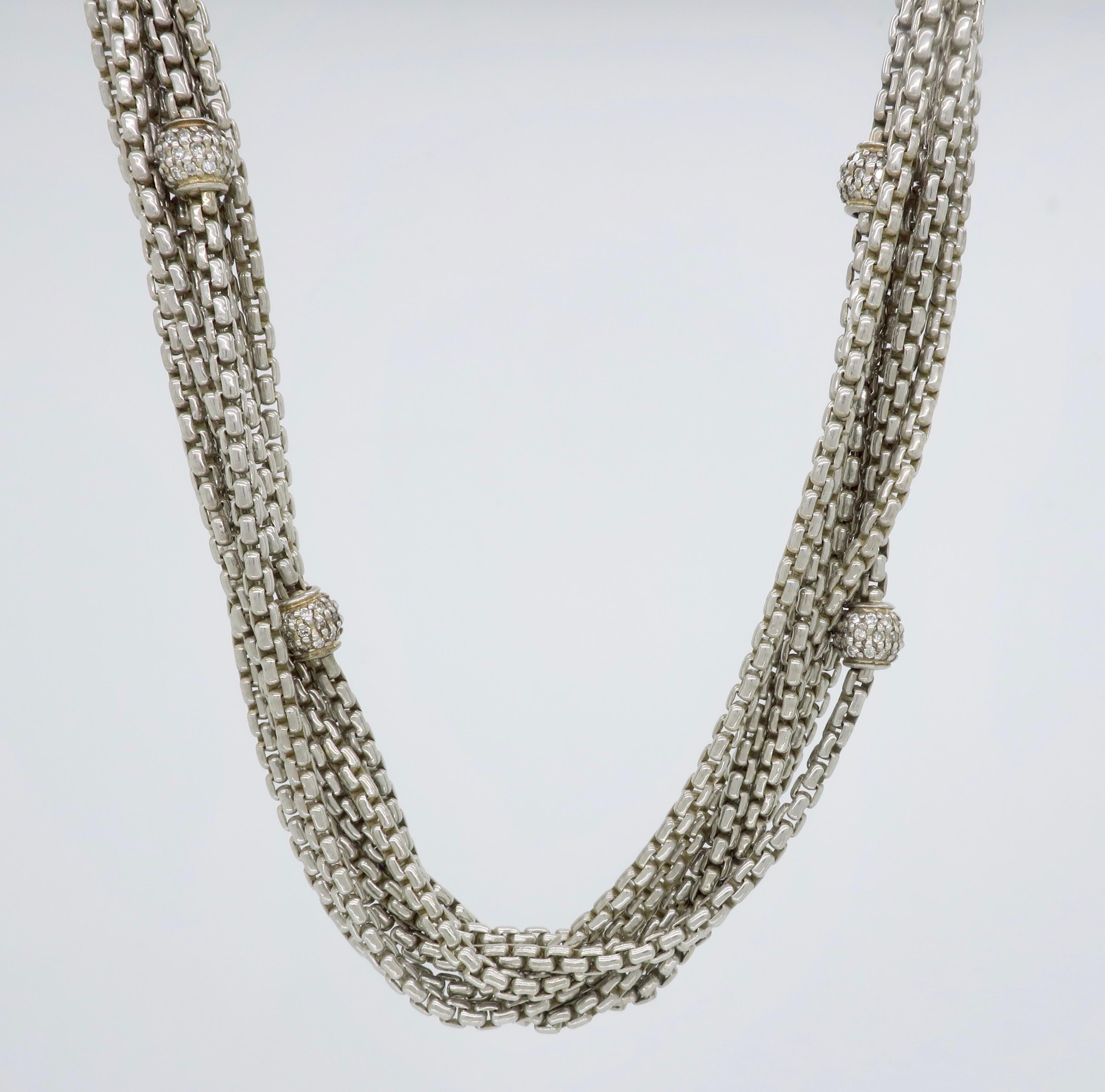 Multi-stranded station diamond necklace crafted in sterling silver and 18k yellow gold by designer David Yurman.

Designer: David Yurman
Diamond Carat Weight: Approximately 1.36CTW
Diamond Cut: Round Brilliant 
Color: Average H-J
Clarity: Average