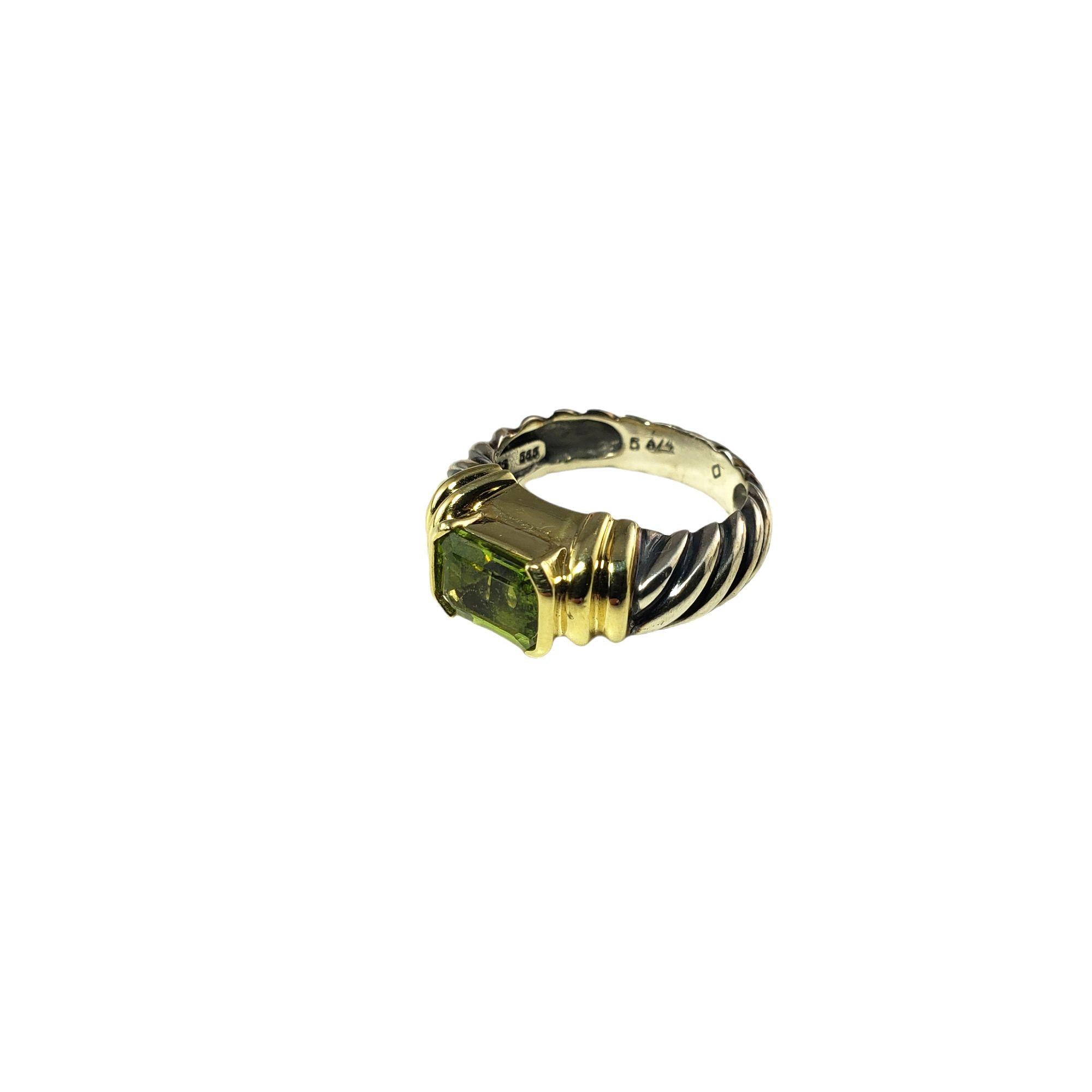 David Yurman Sterling Silver and 14 Karat Yellow Gold Prasiolite Metro Ring Size 5.25-

This stunning ring by David Yurman features one prasiolite gemstone (8 mm x 6 mm) set in beautifully detailed sterling silver and 14K yellow gold. Width: 7 mm.