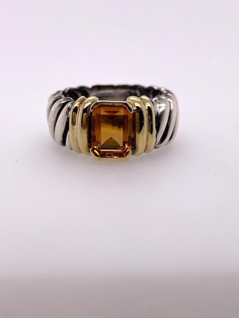 Very pretty ring.  Sterling silver reeded band.  A rectangular faceted citrine is in the center, surrounded by 14K yellow gold.  Made and signed by DAVID YURMAN.  Size 6 and can be custom-sized.  An attractive configuration, with the 