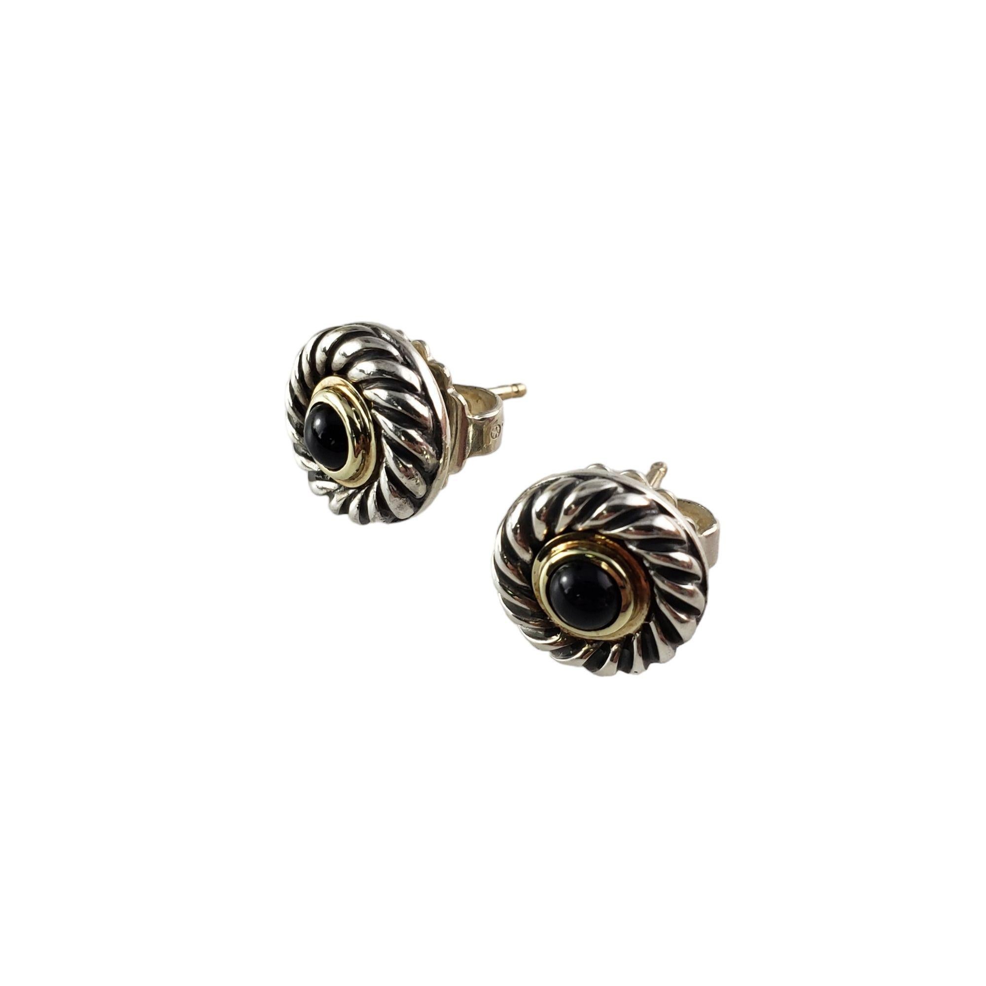David Yurman Sterling Silver/14 Karat Yellow Gold and Onyx Cookie Earrings-

These lovely stud earrings by David Yurman each feature one round onyx stone (3 mm) set in 14K yellow gold and sterling silver.

Size: 11 mm

Weight: 4.0 dwt./6.3