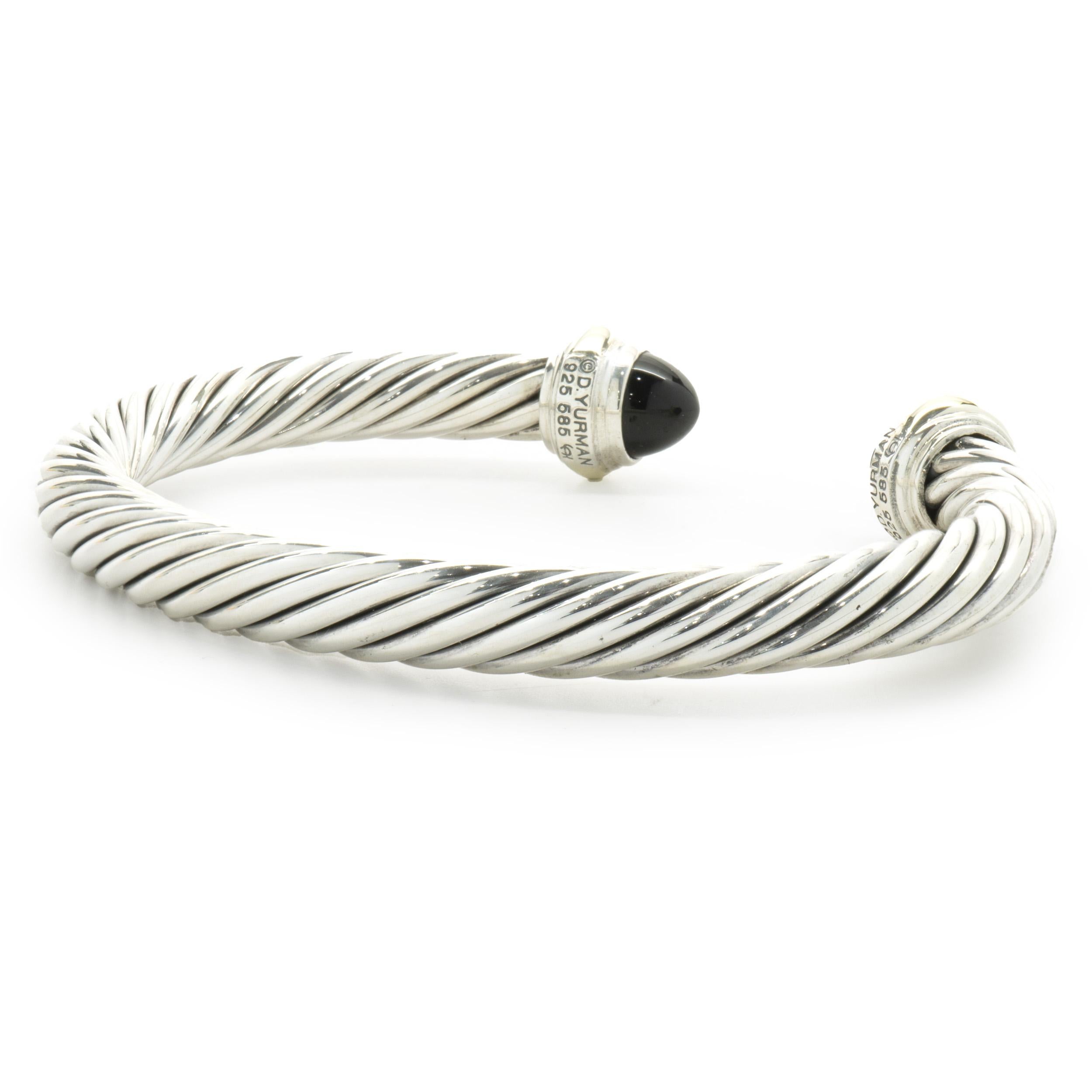 Designer: David Yurman
Material: sterling silver / 14K yellow gold
Dimensions: bracelet will fit a 7-inch wrist

No box or papers included
Guaranteed authentic by seller
