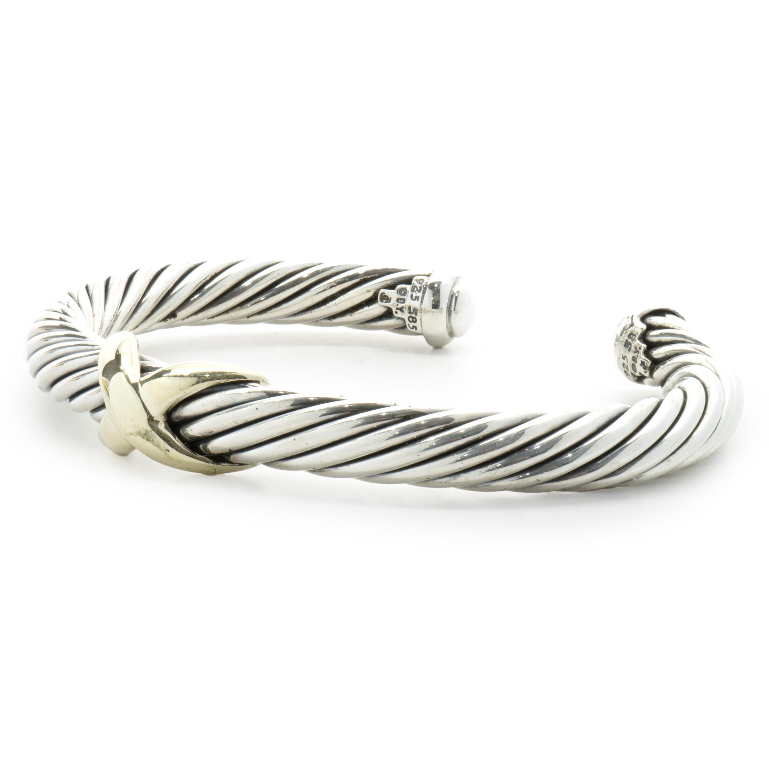 Designer: David Yurman
Material: sterling silver / 14K yellow gold
Dimensions: bracelet will fit a 7-inch wrist

No box or papers included
Guaranteed authentic by seller
