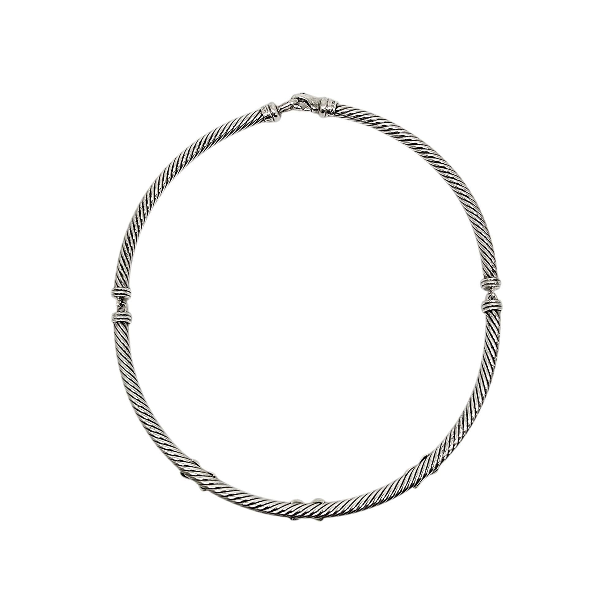 Sterling silver with 14K yellow gold accent triple X collar/choker necklace by David Yurman.

This classic Yurman necklace features his iconic cable design with 3 gold accent Xs at its front center. Lobster claw closure.

Measures approx 5mm wide,