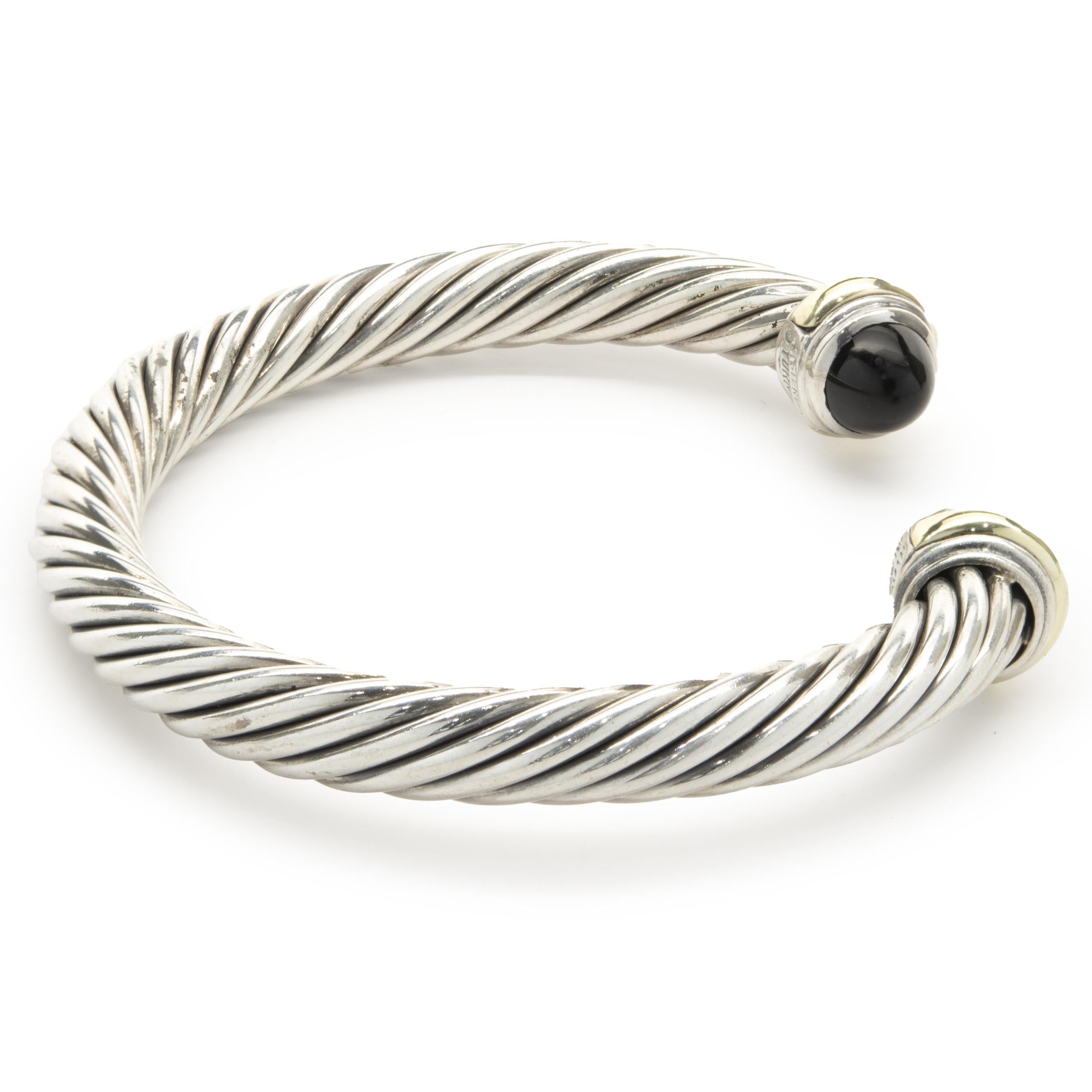Designer: David Yurman
Material: sterling silver/14K yellow gold
Dimensions: bracelet will fit up to a 6.5-inch wrist
Weight: 43.85 grams
