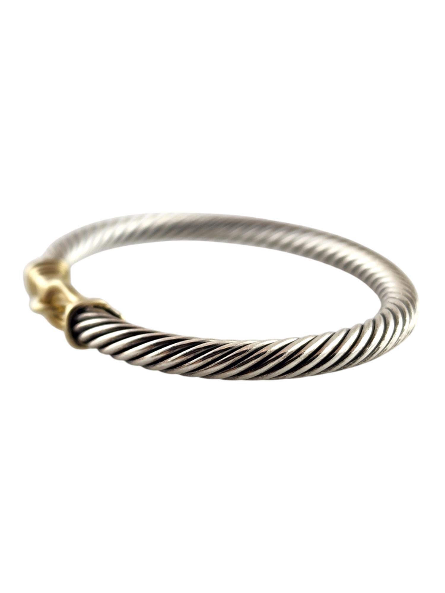 David Yurman Sterling Silver & 14K Yellow Gold Cable Buckle Bracelet

This beautiful cable bracelet by designer David Yurman was crafted from sterling silver with a 14K yellow gold buckle!

Inside measurements: 2 3/16