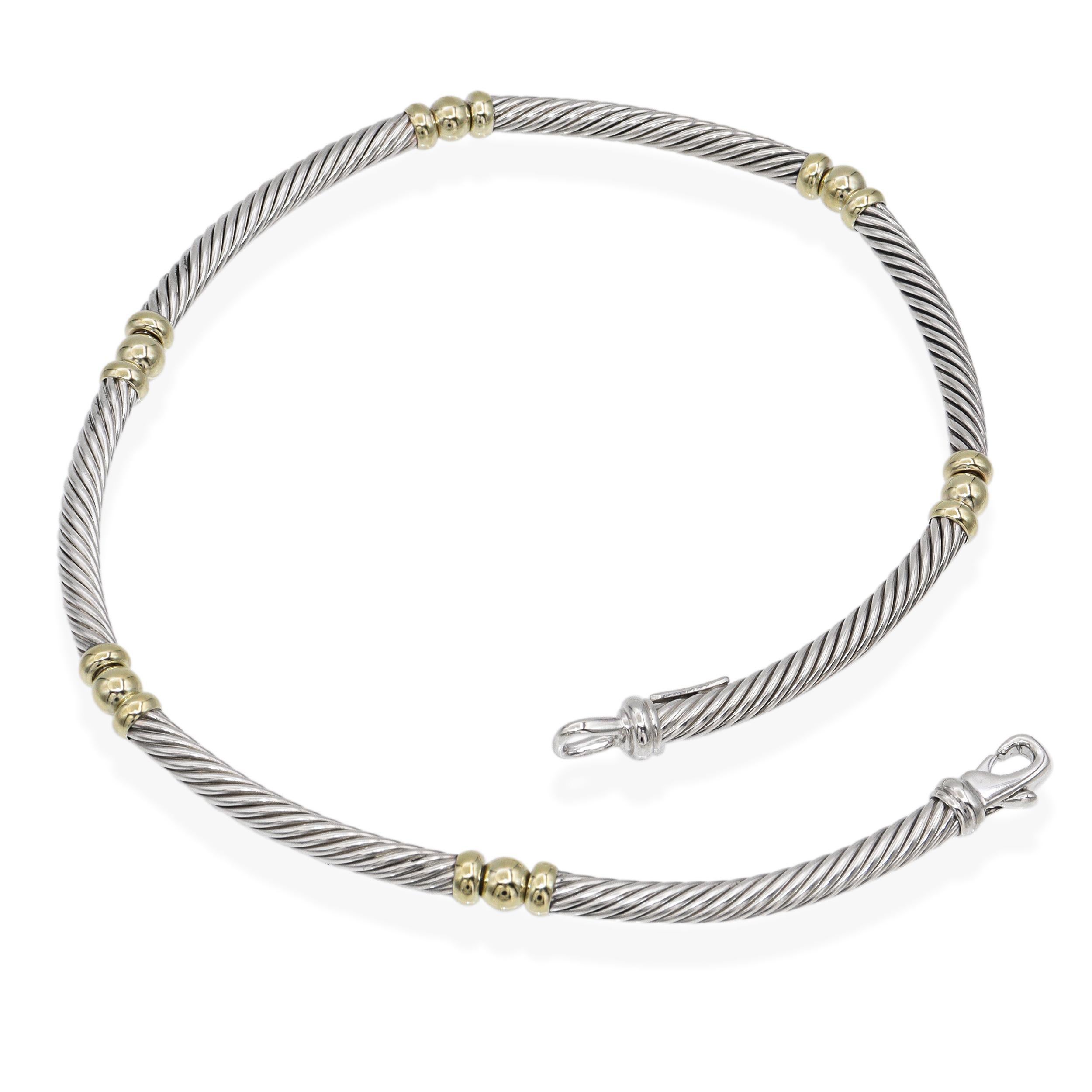 Intramontabile collana David Yurman con cavo, realizzata in argento sterling (.925) e arricchita da stazioni di perline in oro giallo 14K. Caratterizzato dal caratteristico design a elica ritorta del marchio, questo elegante pezzo incarna la miscela