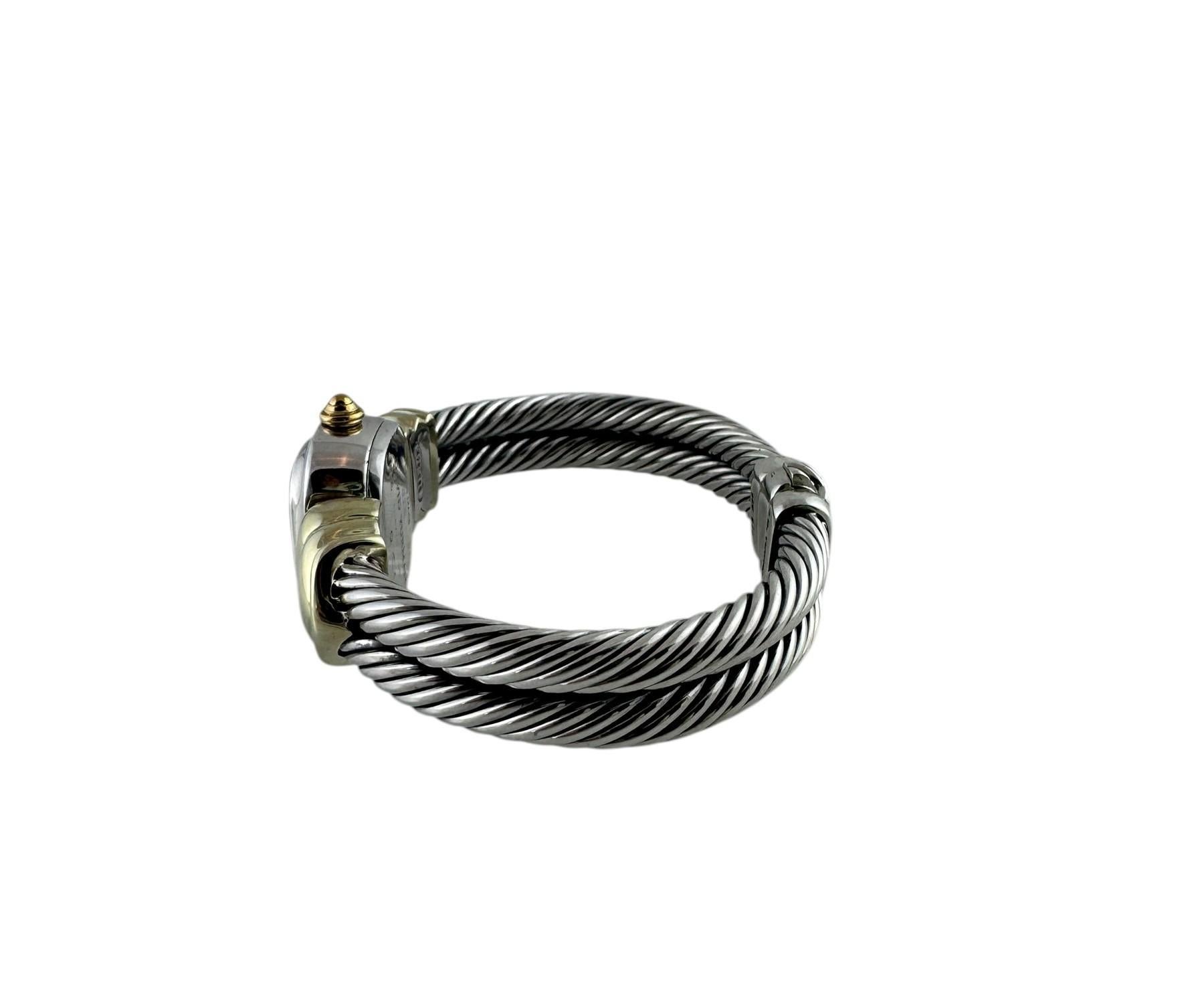 David Yurman Sterling Silver 14K Yellow Gold Cable Ladies Watch

Model: T-6715

This beautiful ladies bangle watch by David Yurman is set in their classic sterling silver cable design. 14K Yellow gold accents

Mother of Pearl Dial. Gold markers.
