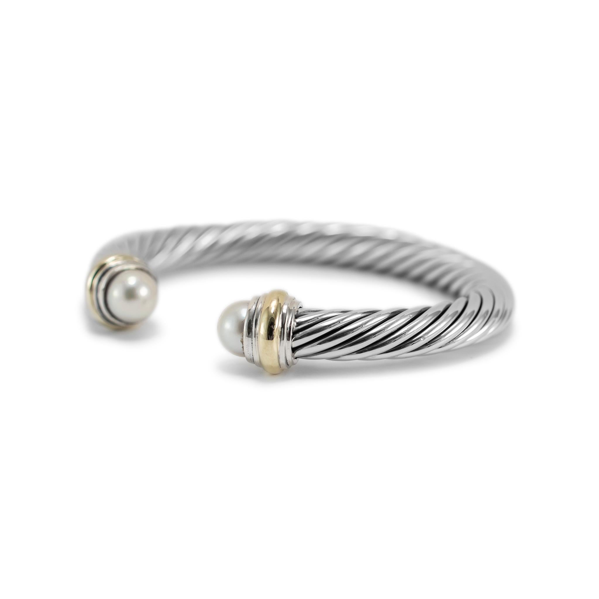 Brand: David Yurman 

Gender: Ladies

Metal Type: 14K Yellow Gold & 925 Sterling Silver

Length: 6.50 inches

Width: 7.00 mm

Weight: 44.32 grams

Ladies 14K yellow gold and silver pearl cuff bracelet. The metals were tested and determined to be 14K