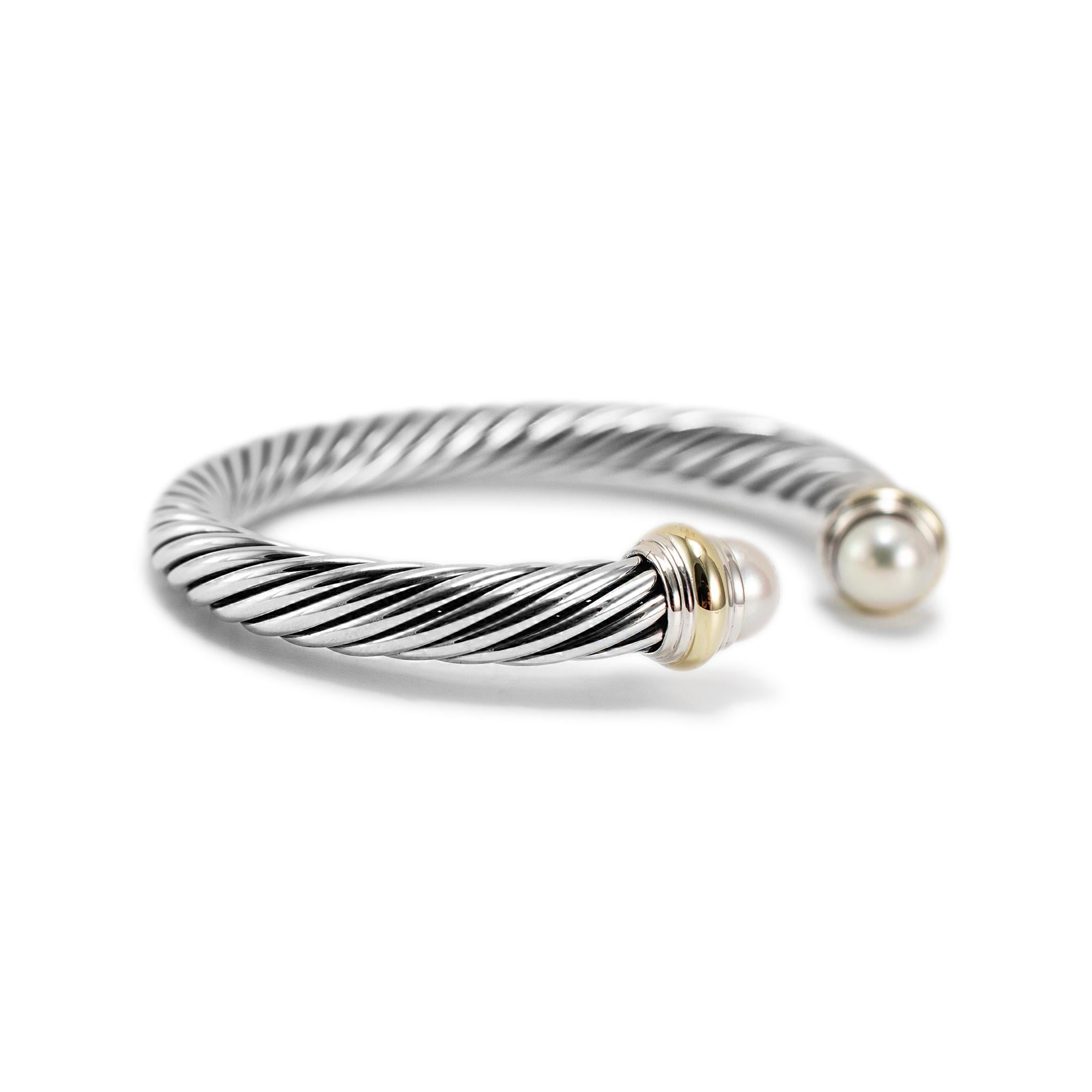 Brand: David Yurman

Gender: Ladies

Metal Type: Sterling Silver & 14K Yellow Gold

Length: 6.50 inches

Width: 7.00 mm 

Weight: 44.01 grams

Ladies 14K yellow gold and silver, pearl cuff bracelet. The metals were tested and determined to be 14K
