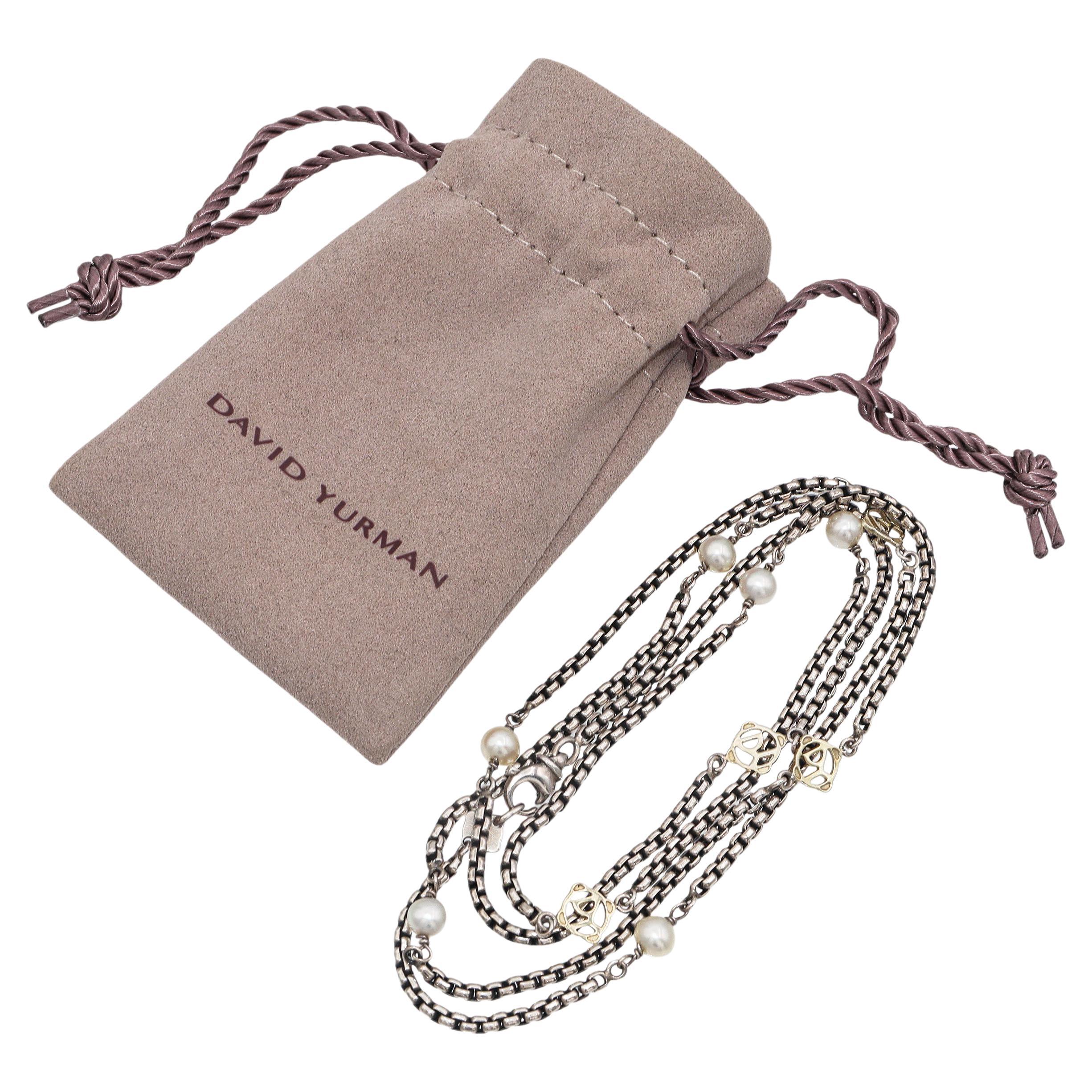 Questa elegante collana David Yurman è realizzata in argento sterling con dettagli in oro giallo 14k. Il design della catena a scatola è arricchito da stazioni alternate con accenti di perle luminose ed elementi traforati in oro giallo 14k. Lo stile